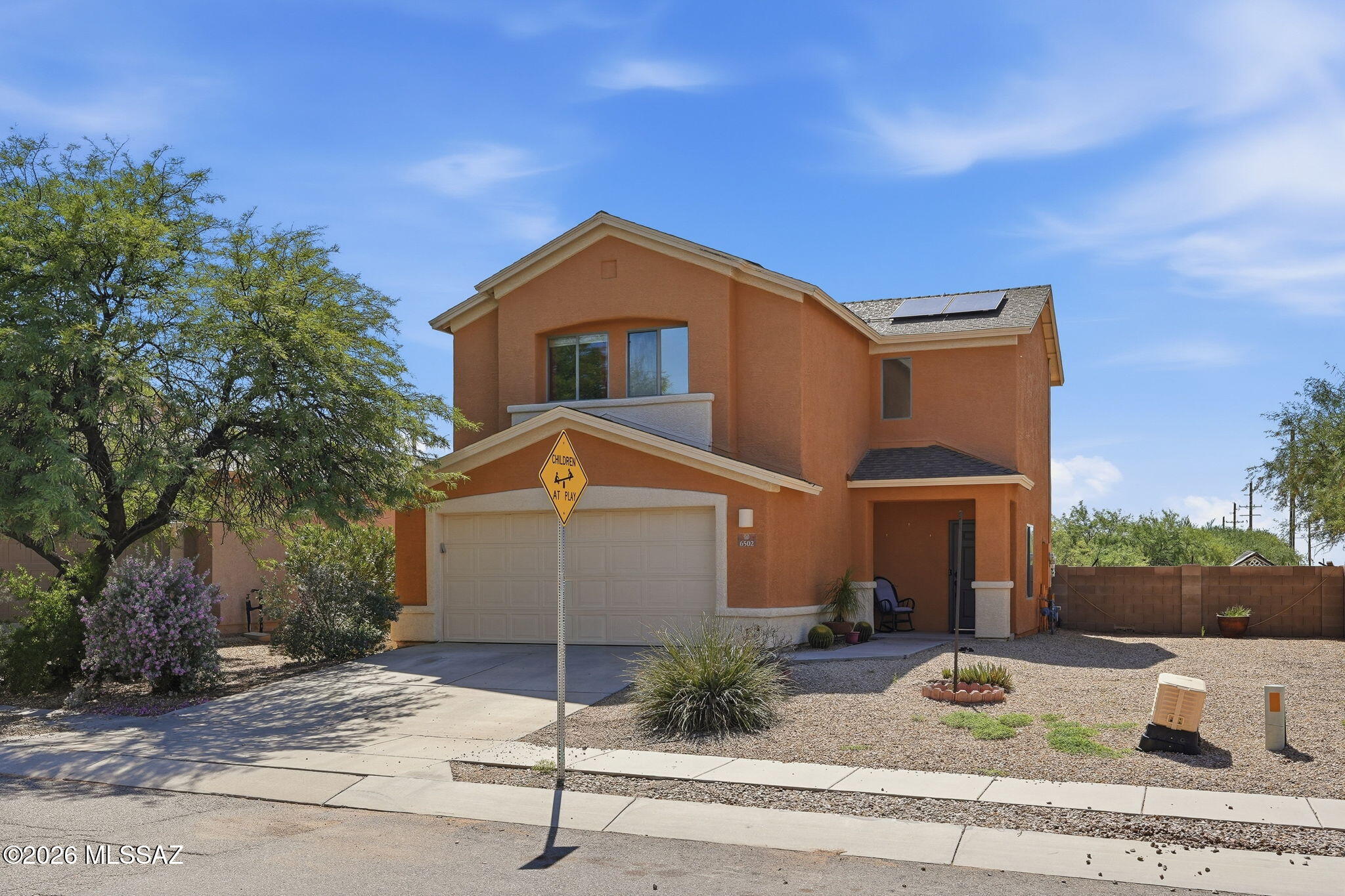 Welcome home to this spacious two-story home situated on a desirable corner lot! The bright, open-concept floor plan offers plenty of room for everyday living and entertaining. Enjoy an updated kitchen featuring rich cabinetry, granite countertops, stainless steel appliances and a large breakfast bar overlooking the dining and living areas. Attractive tile flooring flows throughout the main level, while generously sized bedrooms provide comfortable private spaces upstairs. Oversized backyard with artificial turf, basketball court, trampoline, covered patio & storage shed