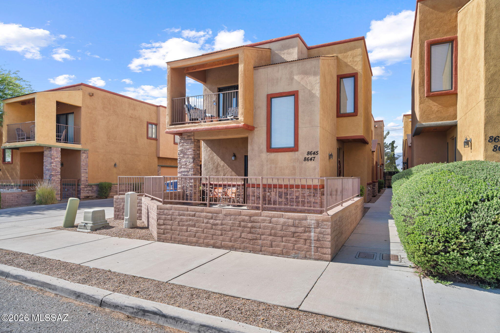 Discover the perfect blend of comfort and convenience in this beautifully maintained 3-bedroom, 2-bathroom townhome. Designed with a clean aesthetic, this home is a move-in ready canvas waiting for your personal touch. Enjoy granite countertops in the kitchen, neutral paint throughout, and durable yet sleek vinyl flooring on the main level. Spacious primary bedroom with a walk-in closet and dual vanity. Laundry is upstairs for added convenience. A rare find for townhome living, this property includes an attached 2 car garage plus additional carport. Streamline your life since the HOA covers items that would otherwise be separate monthly bills, including garbage, water, exterior maintenance, front yard landscaping, AND roof! Schedule a tour of this turn-key property today!
