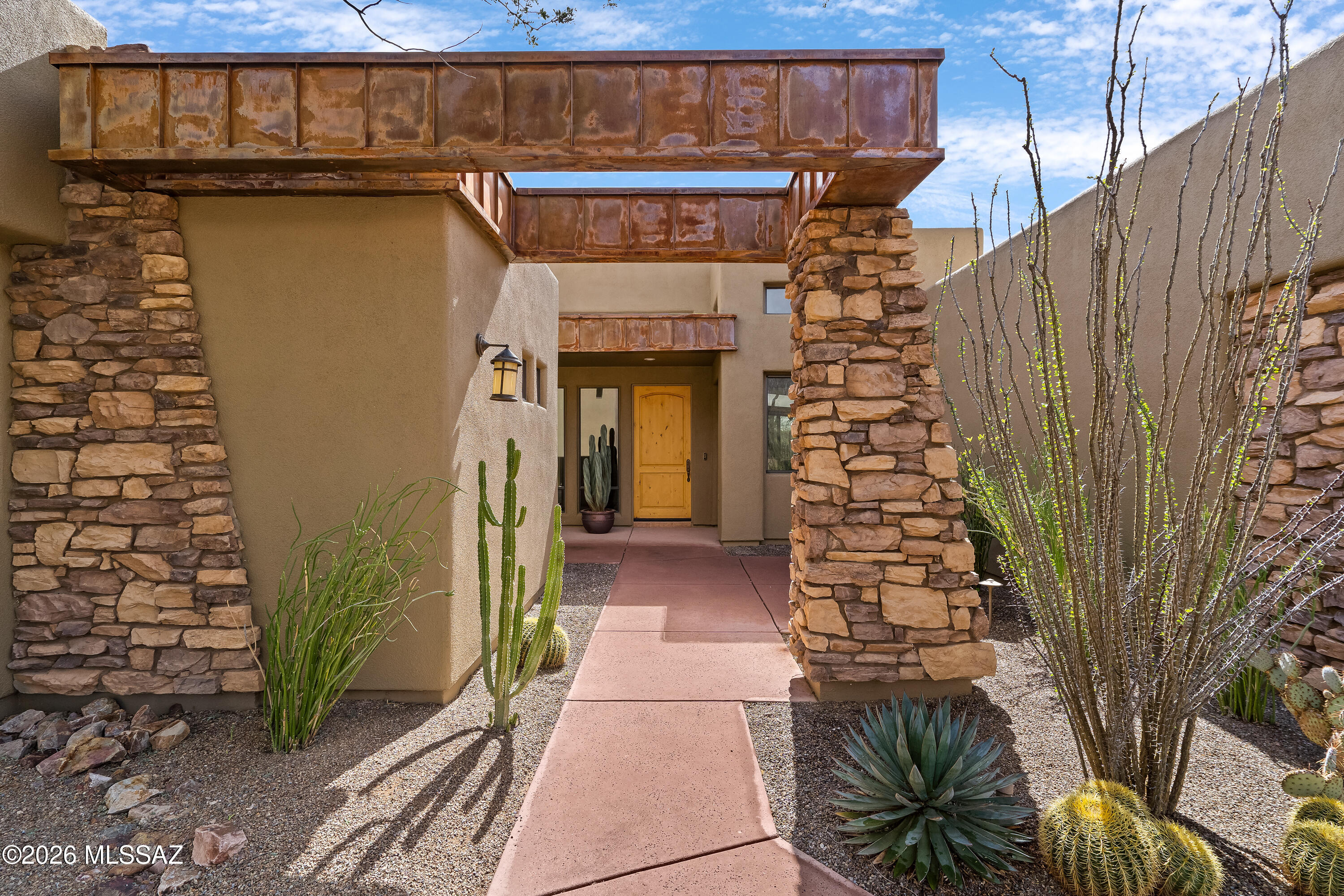 Rare Golf Villa at Solana ! Premier Dove Mountain Setting. Offered by the original owners, this beautifully upgraded and meticulously maintained Golf Villa at Solana is a truly exceptional find. Perfectly positioned on a private corner ~½-acre homesite, the residence captures sweeping 360-degree desert, mountain, and golf course views, uniquely overlooking both the 18th and 10th holes of Gallery North, one of the most coveted locations in the community. Designed for refined desert living, the home features two spacious ensuite bedrooms plus a large executive office, ideal for remote work or a quiet retreat - den. The interiors reflect pride of ownership with thoughtful updates, timeless finishes, and an immaculate, move-in-ready presentation. Step outside to a serene, tucked-away backyard oasis highlighted by elegant desert landscaping, tranquil fountain features, and exceptional privacy--creating the perfect setting for relaxation or entertaining beneath Arizona's dramatic skies.

Located just a short golf-cart ride to The Clubs at Dove Mountain (The Gallery), this residence offers seamless access to championship golf, dining, fitness, and the elevated lifestyle that defines Dove Mountain living.

Scenic. Private. Impeccably maintained. Rarely available.