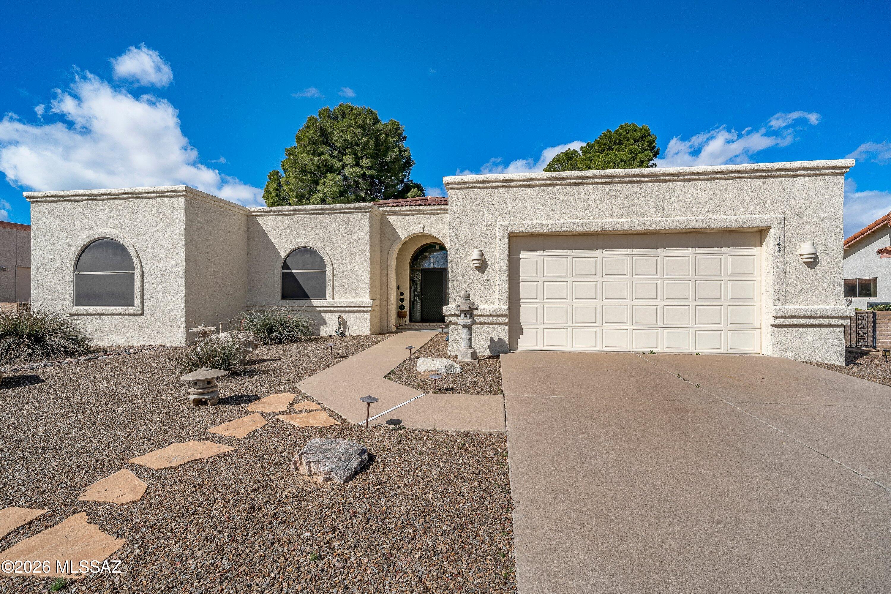 Experience true Green Valley living in Country Club Estates with this inviting 3BD/2BA home backing the award-winning Country Club of Green Valley. Relax and take in serene golf course on the private patio. An arched stained-glass entry welcomes you inside, where thoughtful design shines in the home. The living room create a bright, elegant space perfect for everyday comfort and entertaining, soaring ceilings, a cozy fireplace, & expansive golf course views. The home is filled with natural light. The private office is highlighted by gorgeous design blending function & timeless charm. Large master suite, features walk in closet, large tub, dual vanity & sliding door to patio/golf course views. Kitchen has sliding door to cozy sitting space. The 2car garage includes additional storage space