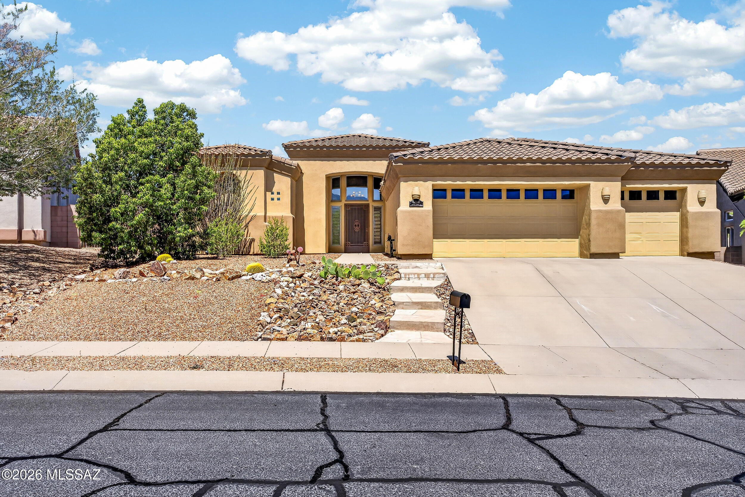 Luxurious living in prestigious Oro Valley! This refined 3,002 sqft 3bed+den/4bath home offers timeless elegance w/fresh 2025 ext paint, custm scurity doors & premium lot w/no immdiate rear nghbors. Inside: soaring tray ceilings, plntation shtters, 8' solid wood drs, gourmet kitchn w/granite, islnd, 6-brner gas cooktp, dble oven, SS appl, wine rack & fridge. Lux owner's suite w/jetted tub & spa-like shwr. Den/office w/built-in desk, cnters & cabinets, 2 lving spaces+frmal dining . Outside: 2 expansive cvered patios, built-in BBQ 3-car finished grage w/epoxy & custom storage. Upgrades: new HVAC/HWH (2024), whole house generator (2023), central vac & more. In desirable Rancho Vistoso w/parks, trails & minutes to shopping & Catalina State Park. Move-in ready desert luxury! SEE UPGRADE SHEET!!