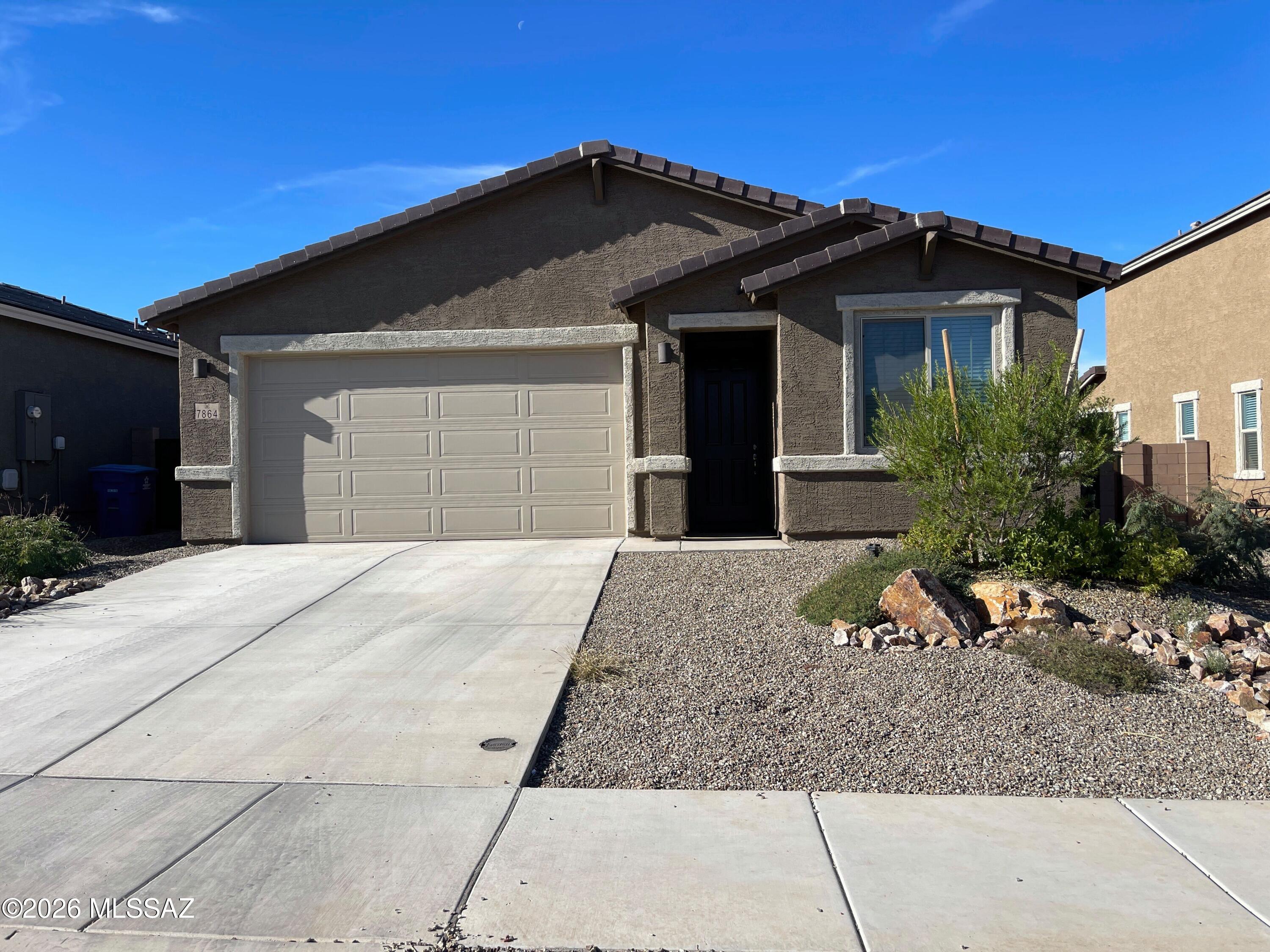 No Application Fees! Beautiful newer single level 3 bedroom, 2 bathroom Tucson home located in the Star Valley community. This well-maintained home features tile flooring throughout all living and high traffic areas with upgraded plush neutral carpeting in each bedroom, neutral paint throughout, recessed LED lighting, 2-inch faux wood window blinds, upgraded fixtures, and great natural lighting. The spacious open living room flows seamlessly into the beautifully appointed kitchen featuring granite countertops, oversized center island with breakfast bar, upgraded cabinetry with crown molding, separate pantry, gas range, stainless steel appliances, and ample cabinet and counter space. The desirable split floor plan provides additional privacy with a spacious primary suite featuring an oversized walk-in closet and private bathroom with an extended dual sink granite vanity, upgraded fixtures, large mirror, and oversized step-in shower. Two additional bedrooms provide comfortable living space for family, guests, or a home office. A full-size washing machine and dryer are included for added convenience. Easy-to-maintain desert landscaping in the front and backyard provides low-maintenance outdoor living with added privacy from having no neighbors directly behind the home.

Star Valley offers neighborhood parks, playgrounds, walking paths, greenbelt areas, and beautifully maintained common spaces. Convenient Southwest Tucson location close to shopping, restaurants, schools, golf courses, and outdoor recreation with easy access to Valencia Road, I-19, Tucson International Airport, Downtown Tucson, and major employment centers throughout the Tucson area.

All residents are automatically enrolled in the Resident Benefits Package (RBP) for $55.00/month which includes Renter's Liability Insurance, Credit Building to help boost the resident's credit scores with timely rent payments, up to $1M Identity Theft Protection, HVAC air filter delivery (for applicable properties), our best-in-class resident rewards program, and much more!