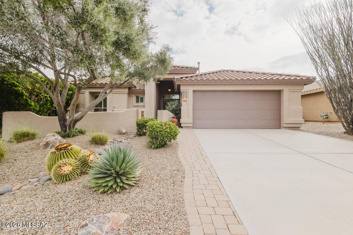 Discover the perfect blend of comfort, style and community in this beautiful 2 bedroom plus den home, nestled in sought after 55+ gated Quail Creek, that truly embraces resort style living. Step inside this FULLY FURNISHED home and you will be greeted by bright open spaces with vaulted ceilings and a welcoming layout that ideal for relaxing or entertaining friends. The kitchen offers elegant quartz countertops and plenty of space to cook and gather. A cozy den offers the flexibility you need. With two spacious bedrooms, two full baths and a convenient laundry room, this home has all the right touches for easy living. Outdoors unwind in your beautifully finished backyard, where you have mountain views and peaceful privacy with no neighbors behind. Quail Creek offers a perfect lifestyle.