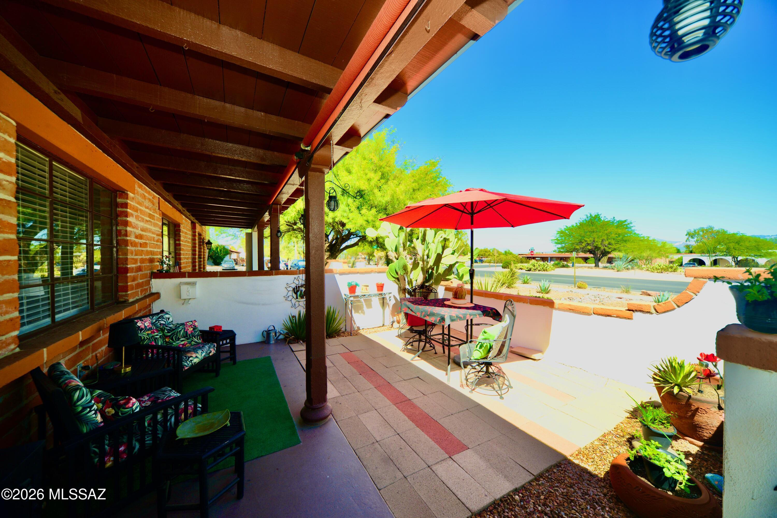 Move in ready 1BD/1BA condo in sought-after Villas West -- one of Green Valley's premier 55+ communities with desirable GVR amenities. Light, bright with an updated kitchen and soothing neutral tones throughout. Enjoy mountain views from your welcoming front patio, a gated private back patio, and a rare private laundry shed with storage. HOA covers roof, HVAC, water, sewer & trash.