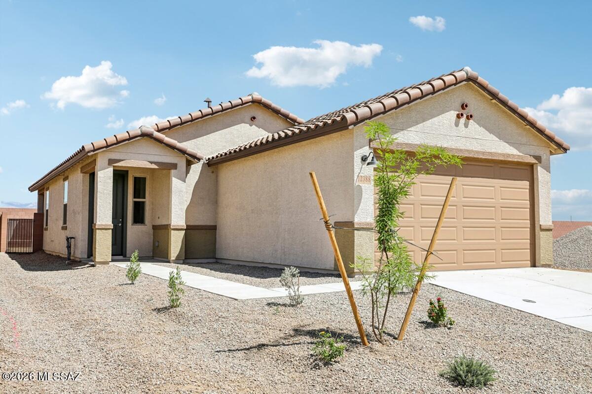 This home is open for self-guided tours daily 8 am - 8 pm. This single-story home features 9-ft. ceilings and ceramic tile flooring throughout. The kitchen showcases Silestone® countertops, 42'' birch upper cabinets, a peninsula, pantry, and Whirlpool® stainless steel appliances. The primary suite boasts a walk-in closet and adjoining bath with a dual-sink vanity and walk-in shower. Price includes discount predicated on using seller's preferred lender KBHS. Property taxes are not available to date.