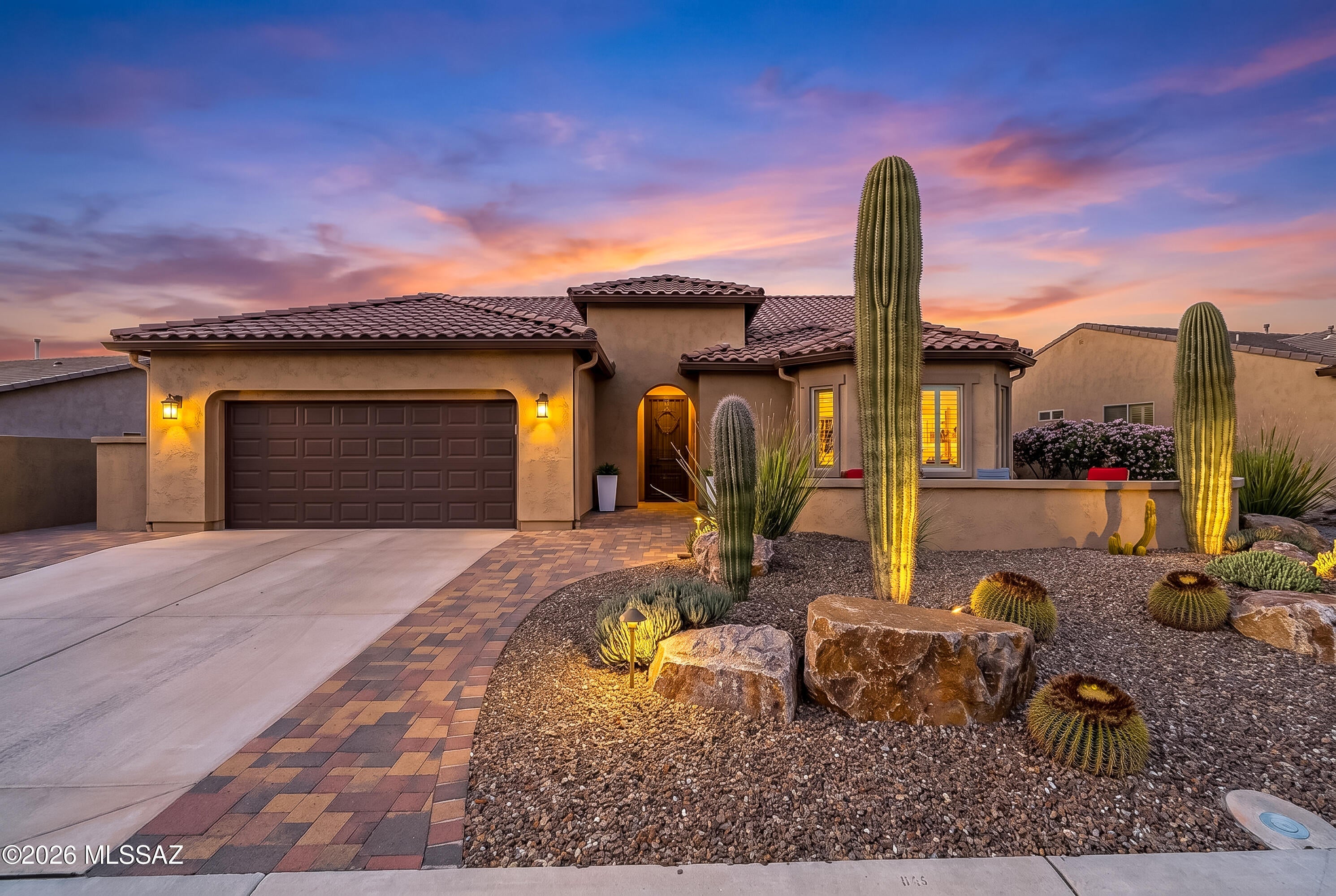 Beautifully maintained Artesa model offering approximately 1,980 square feet with 2 bedrooms, 2 bathrooms and a versatile den--ideally located near the heart of SaddleBrooke Ranch and its outstanding amenities. The thoughtfully designed interior features tile flooring throughout the main living areas, comfortable carpeting in the bedrooms and a light, inviting color palette. The spacious kitchen is appointed with granite countertops, crisp white cabinetry, stainless steel appliances, abundant storage and a generous island with breakfast-bar seating. Step outside to an expansive covered patio and a beautifully landscaped backyard filled with lush, mature desert vegetation--an inviting setting for relaxing or entertaining. Additional highlights include a water filtration system and an oversized two-car garage with an alcove bay providing space for a golf cart, workshop or additional storage. Move-in ready and priced to sell, this exceptional home offers comfort, convenience and the SaddleBrooke Ranch lifestyle buyers are looking for!