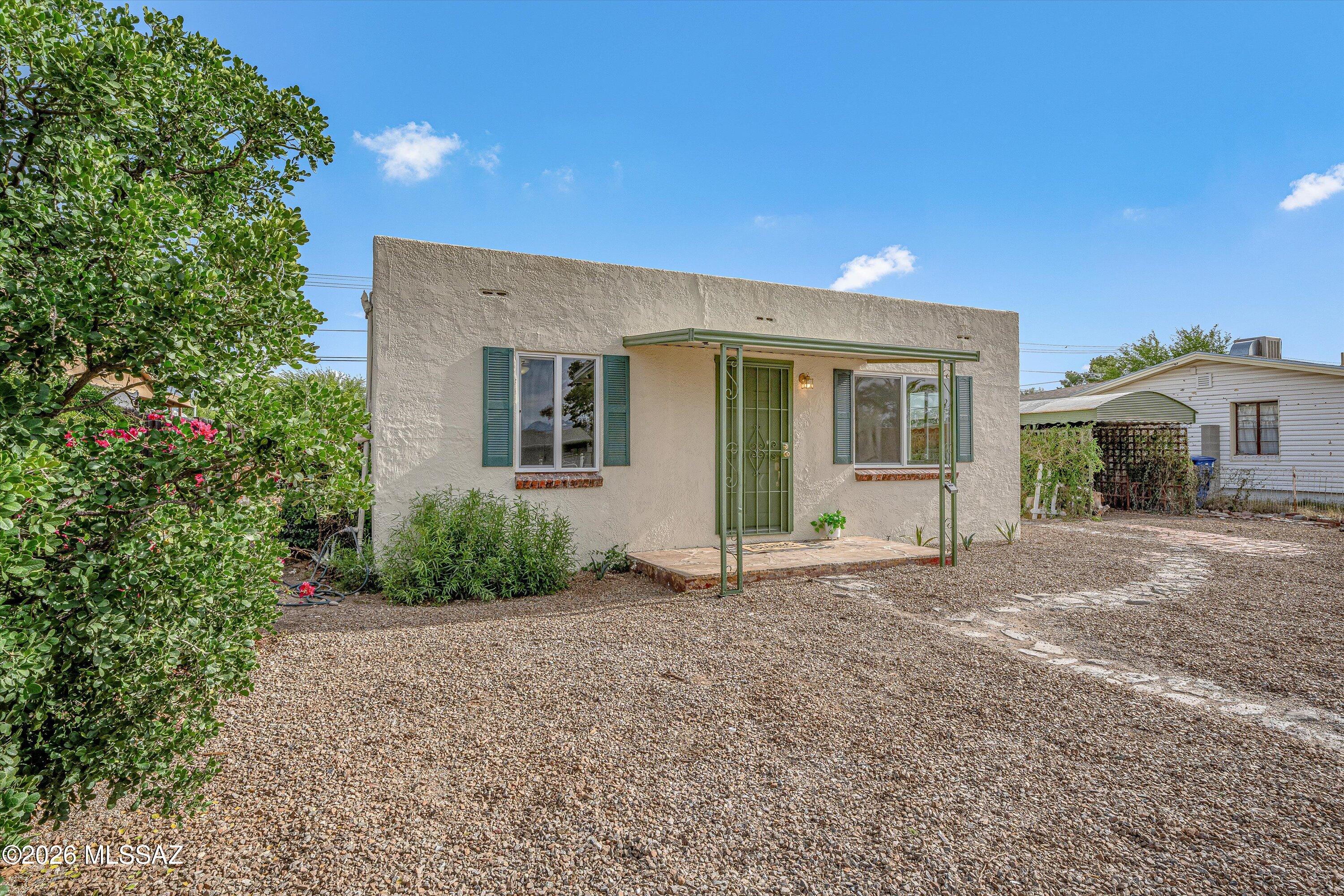 Fully renovated and move-in ready, this centrally located Tucson home blends modern upgrades with unique character. Improvements include a brand-new HVAC system, updated electrical, tankless water heater, dual-pane windows, sliding glass door, new flooring, fresh interior paint, and a remodeled bathroom with custom tile shower. The redesigned kitchen features new cabinets, new quartz countertops, new sink, and stainless steel appliances. Exterior upgrades include stucco repair, full exterior paint, new gravel landscaping for added curb appeal. Attached utility/laundry room offers extra storage. Spacious backyard with endless possibilities plus a rare underground bunker. No HOA. Conveniently located near the University of Arizona, downtown, shopping, and dining.