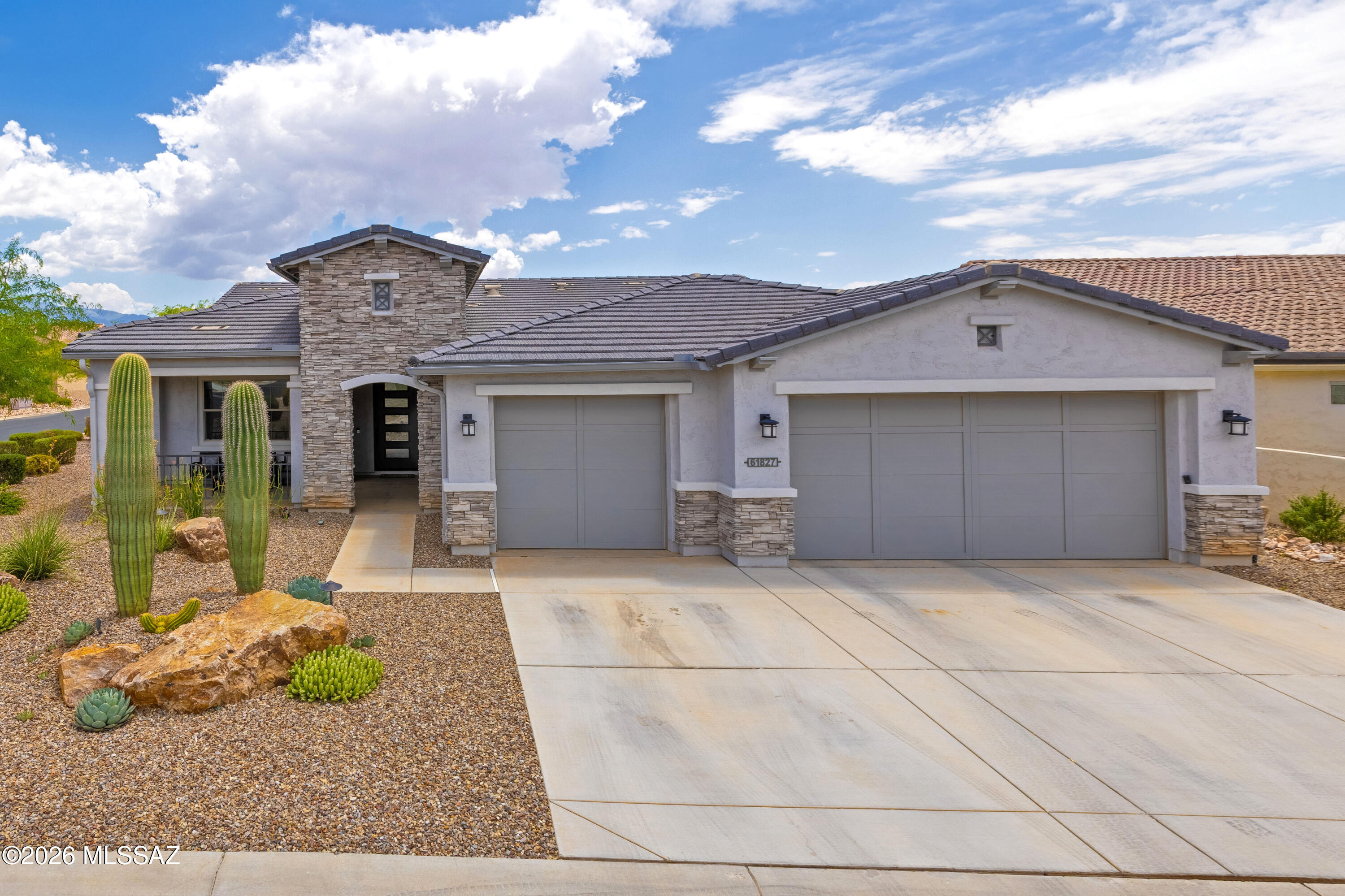 A Highly-Upgraded 2720 Sq. Ft. Avalon Model Exterior Design C with 2-Bedroom En Suites; Powder Room; Great Room w/Dry Bar; Dining Area; Grand Kitchen Island w/Walk-In Pantry; Butler's Pantry; Spacious Den; Master En Suite w/48'' X 84'' Curbless Shower, and Generous Walk-In Closet; 2nd Bedroom En-Suite w/Walk-In Closet; Den/Office; Spacious Laundry Room; Walk-In Linen Closet; Walk-In Coat Closet; Deep 3-Car Garage; 280 Sq. Ft. Outdoor Living Space w/Optional Outdoor Space A; a very large Front Entry Porch; 9', 10' and 11' Ceilings; and with up-grades through-out the home. The Front yard is incredible landscaped and irrigated, with a common area to the left of home with full grown trees. The Backyard is an entertainers' dream i.e., a very large, covered patio w/outdoor fireplace; a Built-In w/outdoor fireplace; a Built-In BBQ Island, Gas Fire Pit, and a Custom-made "Pool by Design" Pool and Spa with an area within the pool where they can be placed and then surrounded by Tavertine Tile (does not get hot!).  The Backyard is also fully landscaped and irrigated, making life easy!
After market improvements to property:
Pool/Spa: Large 6-foot-deep pool with both saltwater filtration system and ultraviolet sanitization system, Pebble Teck pool finish, water feature (waterfall), and LED lights, and low profile, spillover spa.
Exterior: Snake fencing, "Ecowater" water filtration system, Lemon and Key Lime fruit trees, gas connector for outdoor pizza oven,
Interior: Hunter Douglas Power Blinds in great room and dining room, luxury flooring, dual direction blinds in bedrooms, stackable sliding glass wall in great room, plantation shutters in great room and dining area, under cabinet lighting in kitchen + a great more improvements to the home that truly make this residence special!