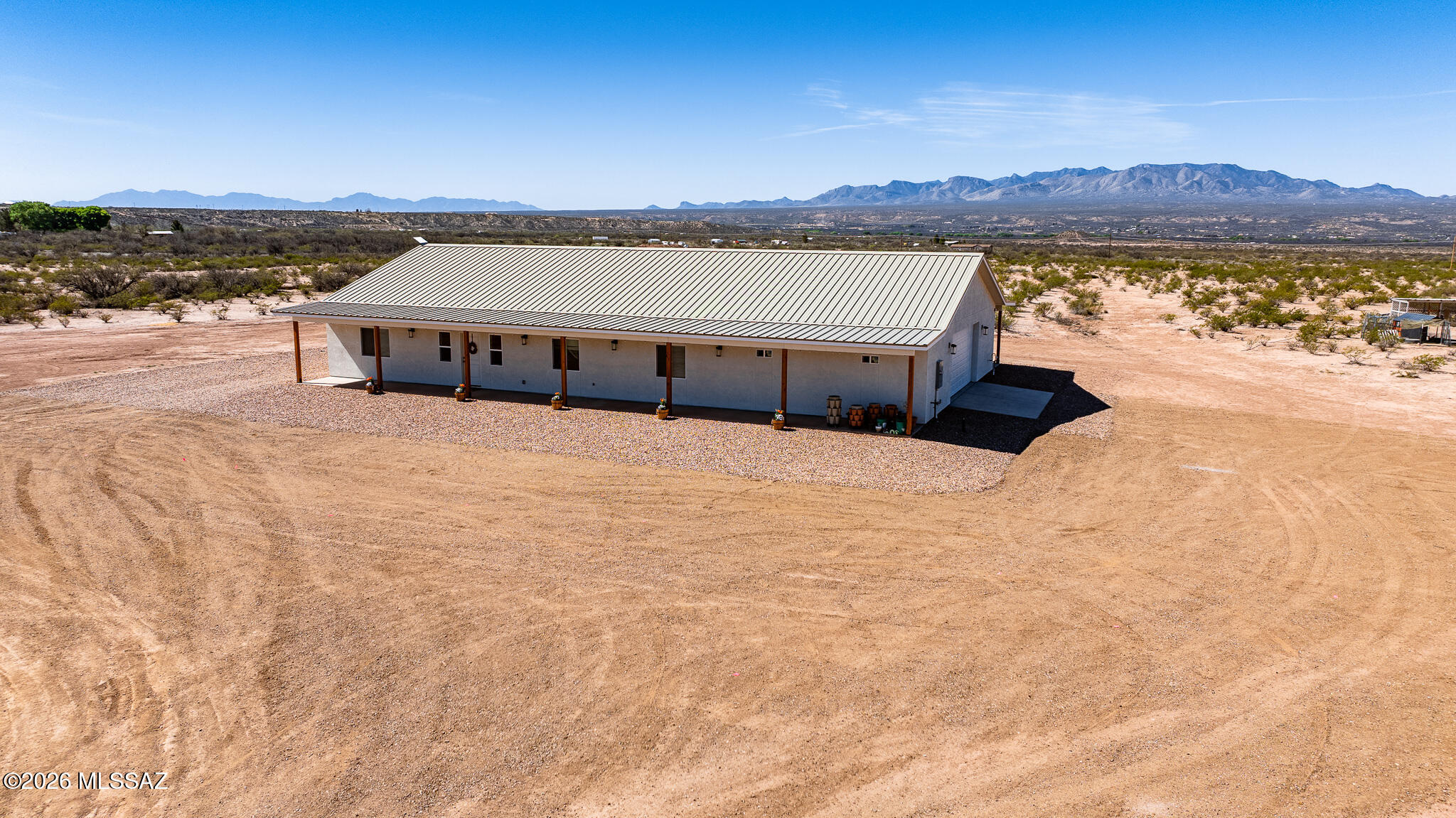 Enjoy country living on 10 acres with panoramic views! This 4BR + bonus room, 2BA home, built in 2024, offers 2,464 sq ft with a split floor plan and open kitchen with walk-in pantry. Primary suite has oversized vanity, separate toilet, and tiled walk-in shower. Energy Star windows, upgraded cooling, spray foam insulation, 160-ft covered porch, oversized garage, shop-ready power, and chicken coop. Room for RVs, hobbies, or a home workshop. Minutes from I-10, privacy, space, and modern comfort all in one! Don't wait!  Call TODAY!