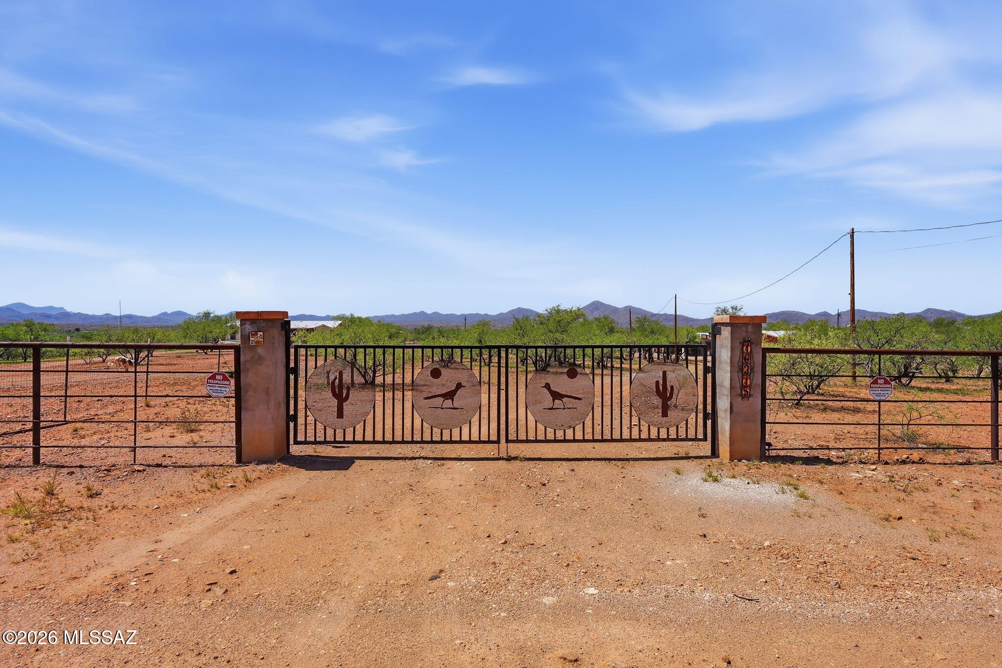 Discover the peaceful beauty of Arivaca with this unique 5-acre property full of potential. The approximately 960 sq. ft. (unpermitted) home, built in 1990, offers 2 bedrooms, 2 bathrooms, and a versatile den that is behind a secret door.
Enjoy plenty of space for your RV, ATVs, trailers, or other recreational toys, with an RV hookup already in place and room for future improvements or expansion (buyer to verify). The property shares a well with one neighboring property and offers the privacy and tranquility of rural living.
Buyer to verify all facts, including square footage, permits, zoning, and allowable uses.