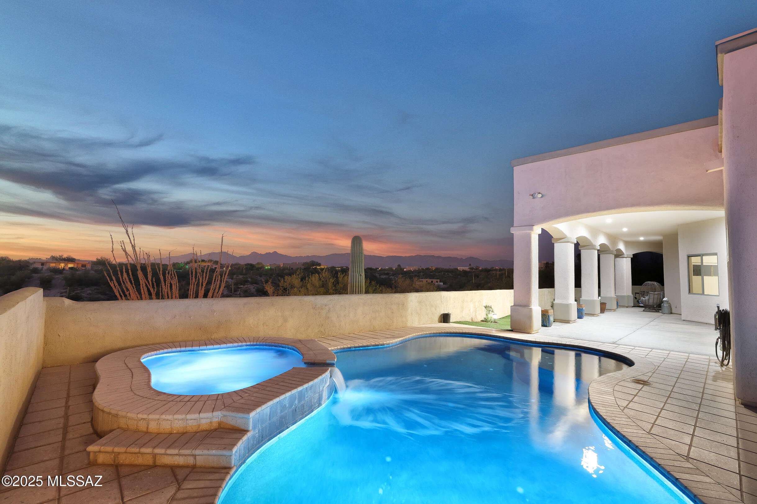 Everything you could ask for & more! Come experience this ultimate retreat on 3+ pristine acres with breathtaking views. This 3,332 sqft custom-built home has 4BD/3BA and is beautifully updated throughout. The gourmet kitchen offers high-end appliances, granite counters, and custom cabinetry, while the primary suite offers a private sanctuary with a spa-inspired bath & spacious walk-in closet. Amazing 1,230 sqft guest house with 2BD/2BA is ideal for guests or multi-generational living. Horse facilities include a functional barn with space for tack and hay, ample trailer parking, and immediate access to the wash with miles of riding trails. Backyard pool, spa, and expansive covered patio. Plus, oversized 3-car garage, and Tanque Verde Schools too! Stunning Panoramic Views!
Mountain Ranges, Sunsets, and City Lights
Gated Community
4,562 Square Feet (combined 3,332 Main House / 1230 Guest House)
Guest House Added 2024 - Converted from RV Garage
3.34 Acre Horse Property
Horse Barn with Hay Storage, Garage Parking, Tack Room & Corral
Direct Access to Wash and Miles of Riding Trails
Near Saguaro National Park East
Tanque Verde School District
Rancho Cancion East Subdivision
Oversized 3-Car Garage

THE HOME
Custom Built in 2004 (Previous Owner/Builder)
Elevated Lot with 360° Views
Professionally Landscaped Entry Courtyard
Grand Covered Entry with Over Height Door and Decorative Wrought Iron Detailed Windows
3,332 Square Feet - 4 Bedrooms, 3 Full Baths
Bright/Open Interior - High Ceilings and Large Windows
Updated Gourmet Kitchen with all new LG appliances in 2024
3 Gas Fireplaces - Living Room, Family Room, & Primary Bedroom
Split Bedroom Floor Plan
Jack and Jill Bath between Bedrooms 2 & 3
Large Laundry Room with Sink
Expansive Covered Patio
Sparkling Pool and Spa with Fountain
Artificial Turf Lawn
Attached 3-Car Garage with Storage

THE KITCHEN
Designed with Large Windows to Maximize Views
New Granite Counters & Tile Backsplash
Center Island
Custom Hickory Cabinetry
LG Stainless Steel Appliances
Gas Cooktop
Wall-Mounted Pot Filler Faucet
Walk-in Pantry
Large Breakfast Bar
Breakfast Nook
Formal Dining Room

PRIMARY BEDROOM
Private Wing
Access to Backyard Patio, Pool/Spa
Oversized Bathroom
Huge Walk-in Shower
Soaking Tub
Double Sinks with Ample Counter Space and Storage Cabinets
Additional Vanity Desk
Oversized Walk-in Closet

GUEST HOUSE
1,230 Square Feet
2 Bedrooms (including 1 Loft) and 2 Full Bathrooms (Two units with 1BD/1BA each)
Open Concept Kitchen/Living Area
Transom Windows for Added Light and Mountain Views
Full Kitchen and Laundry Room
Loft Bedroom
2nd Bedroom/1 Bath with Kitchenette Area and Loft Storage Area
Private Entry for Each Unit
Separate Parking Area