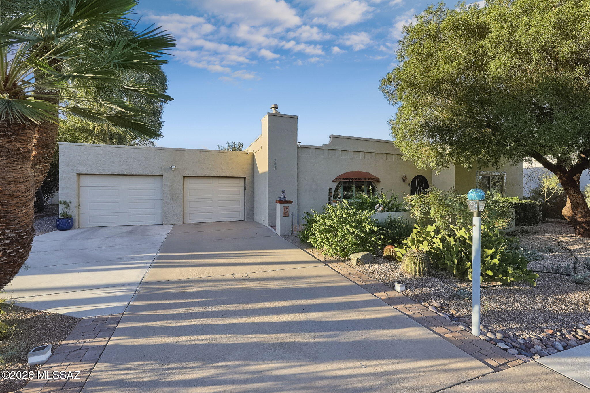 The Perfect Fit: Easy Living Meets an Active Lifestyle. Whether you're a seasonal snowbird or want a year-round Green Valley home, this immaculate golf-side gem is the ideal footprint. Bright and open with NO GVR, it's perfect for lock-and-leave ease or daily enjoyment. Enjoy a private front courtyard, large arched windows, plantation shutters, quartz countertops, a 2-car garage, and a cozy gas fireplace. The primary suite has flexible space for a home office or multi-purpose room without sacrificing your main living areas. Start mornings in the spacious, shaded, east-facing screened room watching the sunrise over the 16th green, then relax or entertain in the private, walled backyard. Spend afternoons on a leisurely golf cart ride through the manicured streets of Country Club Estates. Unmatched Financial Freedom & Community Perks. Savvy buyers seeking a high-quality neighborhood without mandatory extra fees will find this home a rare opportunity. The highly coveted NO GVR status puts you in full control of your housing costs, yet membership can easily be added, so you give up none of the recreation benefits. You decide when and whether the amenities fit your lifestyle, rather than paying for them from day one.

A modest HOA fee covers common area and road maintenance, keeping the streets pristine and the neighborhood looking its best year after year. It's a simple, predictable way to protect your investment and enjoy a well-kept setting without the extra work.

Best of all, the GVR East Center is just a 3-minute golf cart ride away, putting recreation close at hand whenever you want it. For a casual bite, the fairways are a quick trip to Taco Giro & Fore Golf, a convenient spot to relax after a round or a morning out. This is more than a place to live. It's a gateway to a low-stress, well-connected Arizona lifestyle with the freedom to choose the amenities that fit you!