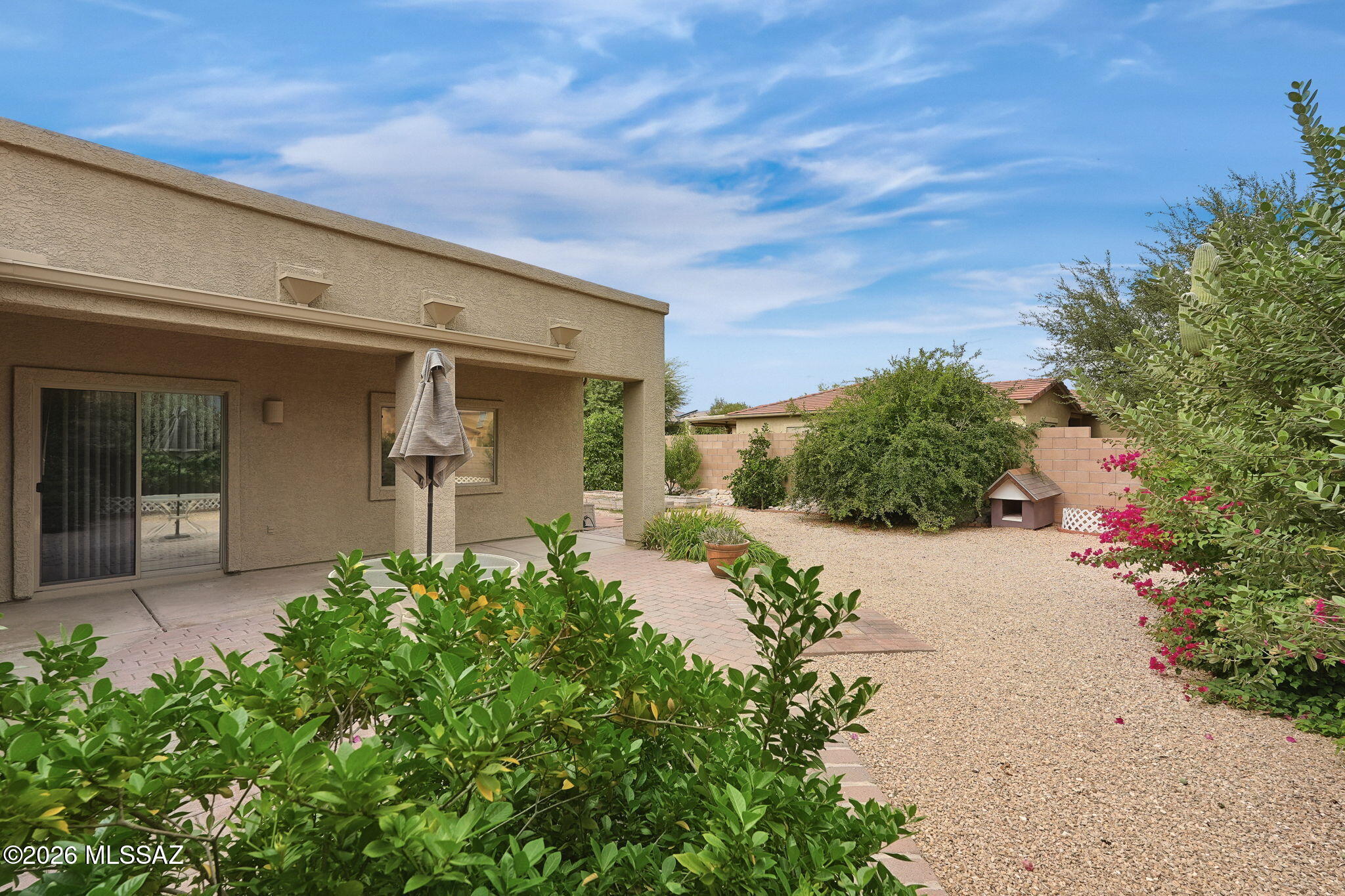 Beautifully maintained 4-bedroom, 2-bath Black Horse Ranch home with new roof in 2026 and a recently installed HVAC. It sits on a corner lot with a rare 3-car garage! Open floor plan, high ceilings and a spacious great room. Primary suite offers a walk-in closet and dual sinks. Full laundry room with sink; refrigerator, washer and dryer included. Mature backyard features mountain views, covered and brick patios, raised garden beds, a rare backyard access gate, and pineapple guava, pomegranate, orange, nectarine, grapefruit and lemon trees. Insulated backyard shed has drywall, double-pane windows and finished flooring. Walk to Coronado K-8 School and the neighborhood park with a covered picnic area, baseball field, basketball court and dog park. Minutes north of Oro Valley!