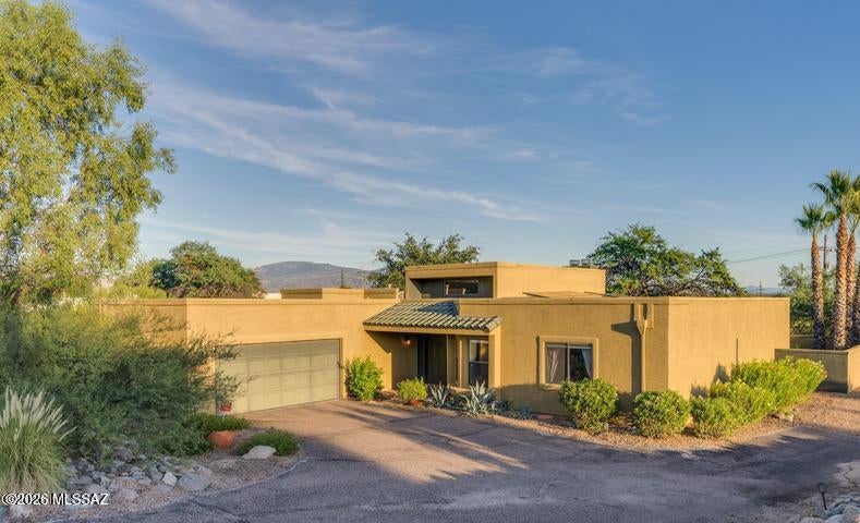 Now Offered at $535,000 after a one-time price improvement. Set on a .81-acre Foothills lot, this 3-bedroom home offers a rare combination of charm, privacy and practical living space. High ceilings, clerestory windows and skylights fill the home with natural light, while the fireplace adds warmth and character. The kitchen features granite counters, stainless appliances and a 5-burner gas range. A spacious primary suite, two additional bedrooms and a flexible bonus room well suited for a home office or fitness space give the layout useful versatility. Outside, enjoy a covered brick-paver patio, turf and mature landscaping, with no immediate neighboring home on one side adding to the sense of openness and privacy. Newer HVAC, generous lot size and a comfortable Foothills setting make this a home that simply works