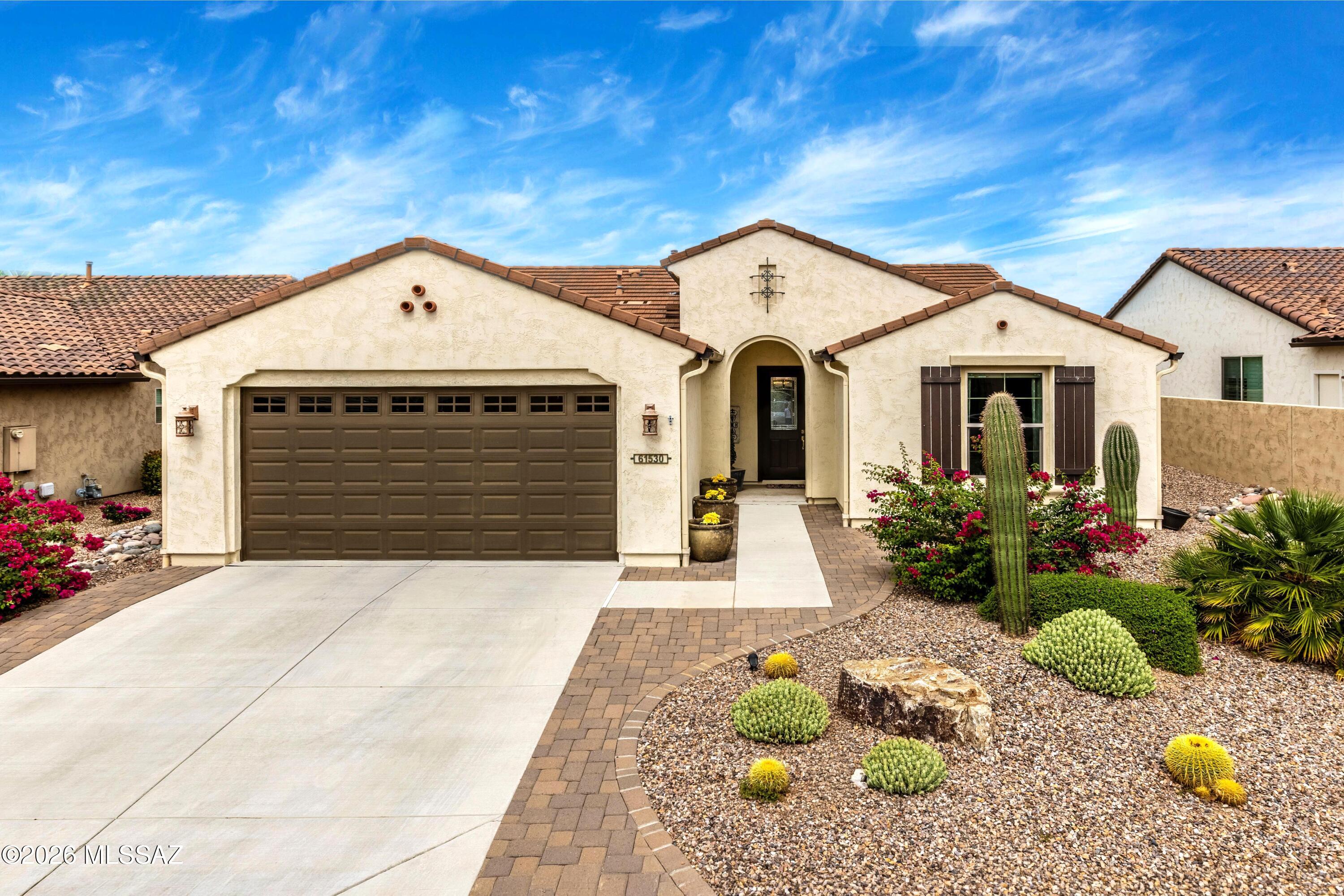 A 1,528 Sq. Ft Hermosa Elevation Design a Hermosa Model located in an incredibly quiet section of SaddleBrooke Ranch. The home consists of 2-Bedrooms + 2-Bathrooms; Great Room; Dining Area; Large Kitchen Island; Generous Walk-In Closet in Master-Suite; Master Bath 42'': X 60'' Shower and Built-In Seat, and Optional Bay Window; Owner's Entry Valet w/Cabinets; Separate Laundry Room; 140 Sq. Ft. of Covered Outdoor Living Space; Deep-2-Car Garage w/Storage Alcove; 9' & 10'' Foot Ceilings; Laundry Room w/Storage. The front yard is professionally Landscaped; and has access directly into the home by a Cobblestone Ribbon alongside the driveway. The Backyard is walled on 3-sides of the home, has an extended cobblestone patio, is fully landscaped and irrigated, one fountain. The home is conveyed with Washer, Dryer, and Refrigerator. This home is priced very competitively, and you cannot get into this neighborhood at this price!