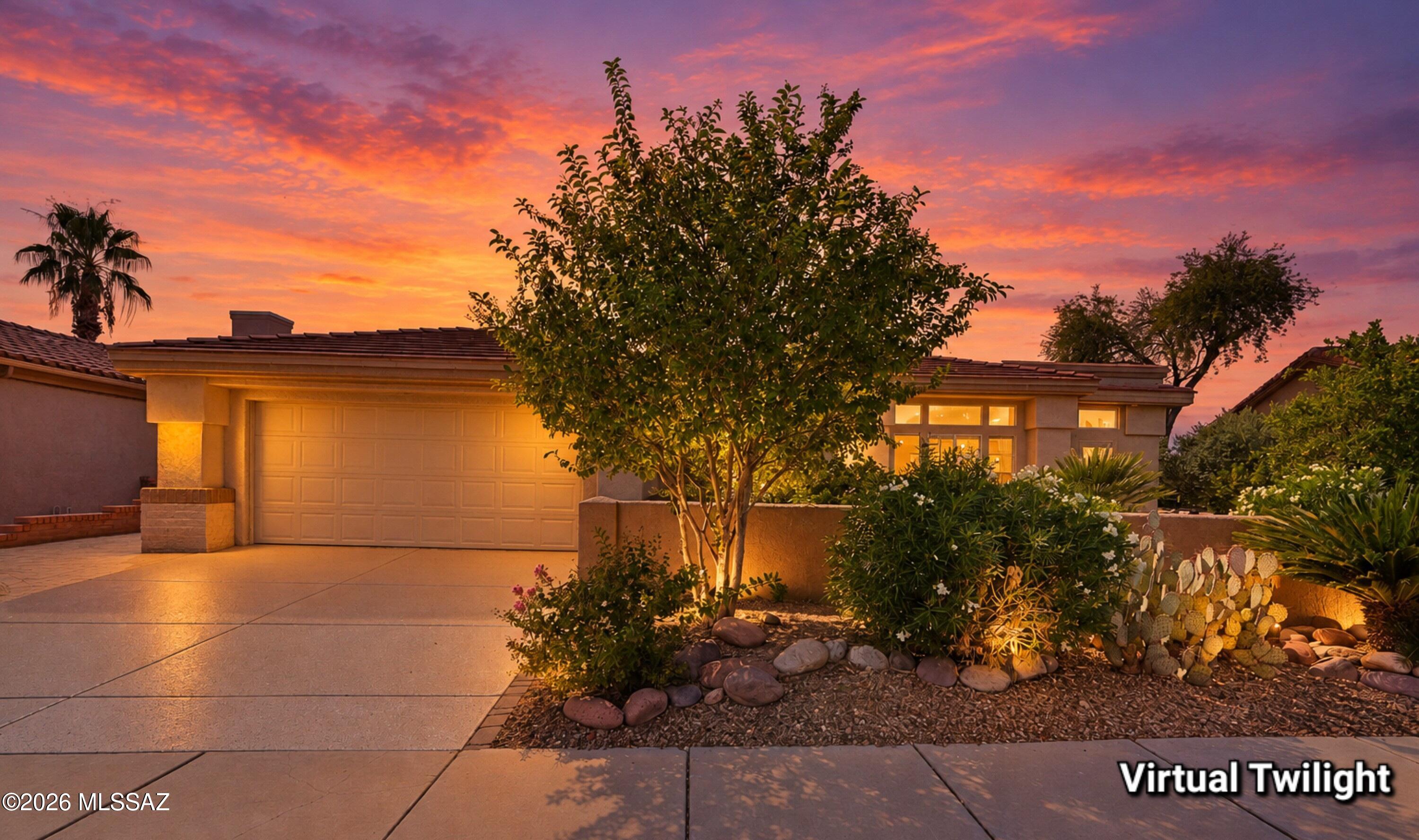 Breathtaking Catalina Mountain views frame this beautifully expanded Windsor model. The entry opens to an extended living/dining space overlooking a park-like backyard. A chef's kitchen anchors the home, fully equipped with upgraded cabinets, quartz counters, & ample storage. The main suite boasts a custom travertine accent wall, walk-in closet, dual vanity, & new walk-in tub. A versatile addition provides incredible flexible space, including a dedicated office with a slider to the yard, bonus closet, & a flex room with private front courtyard access. Guests will love the large secondary bedroom next to the full guest bath. The private yard features a deep extended covered patio, mature citrus trees, & lush foliage. Your desert retreat awaits!