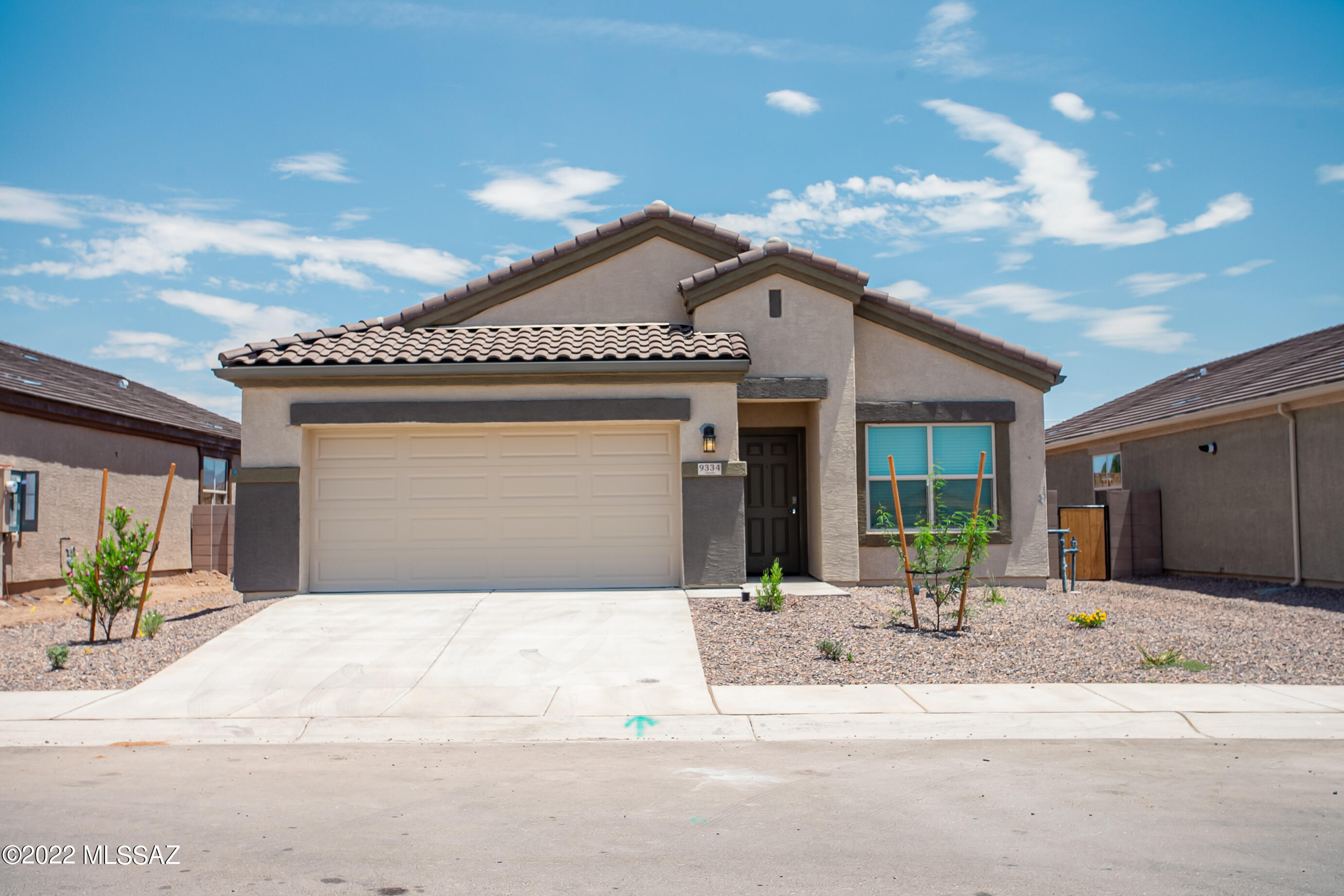 RARE 2022 BUILD 5 BEDS 3 FULL BATHS 2 car garage 1 story home in desirable Saguaro Bloom, only 6 mins to I10 & Premium Outlet Mall, near by schools, grocery stores, entertainments, shopping & businesses. Wonderful Van Buren model w/great flow, no space wasted. Very bright & open concept w/tall ceiling & lots of nature light. Big laundry room. Many closets, shelves & storage throughout the house. Great sized kitchen w/big island boasts beautiful granite counter top, dark espresso cabinets & SS appliances. Nice sized private backyard w/covered patio & block fence. Community features lovely landscaping, pools, spas, splash pad, playgrounds & parks.