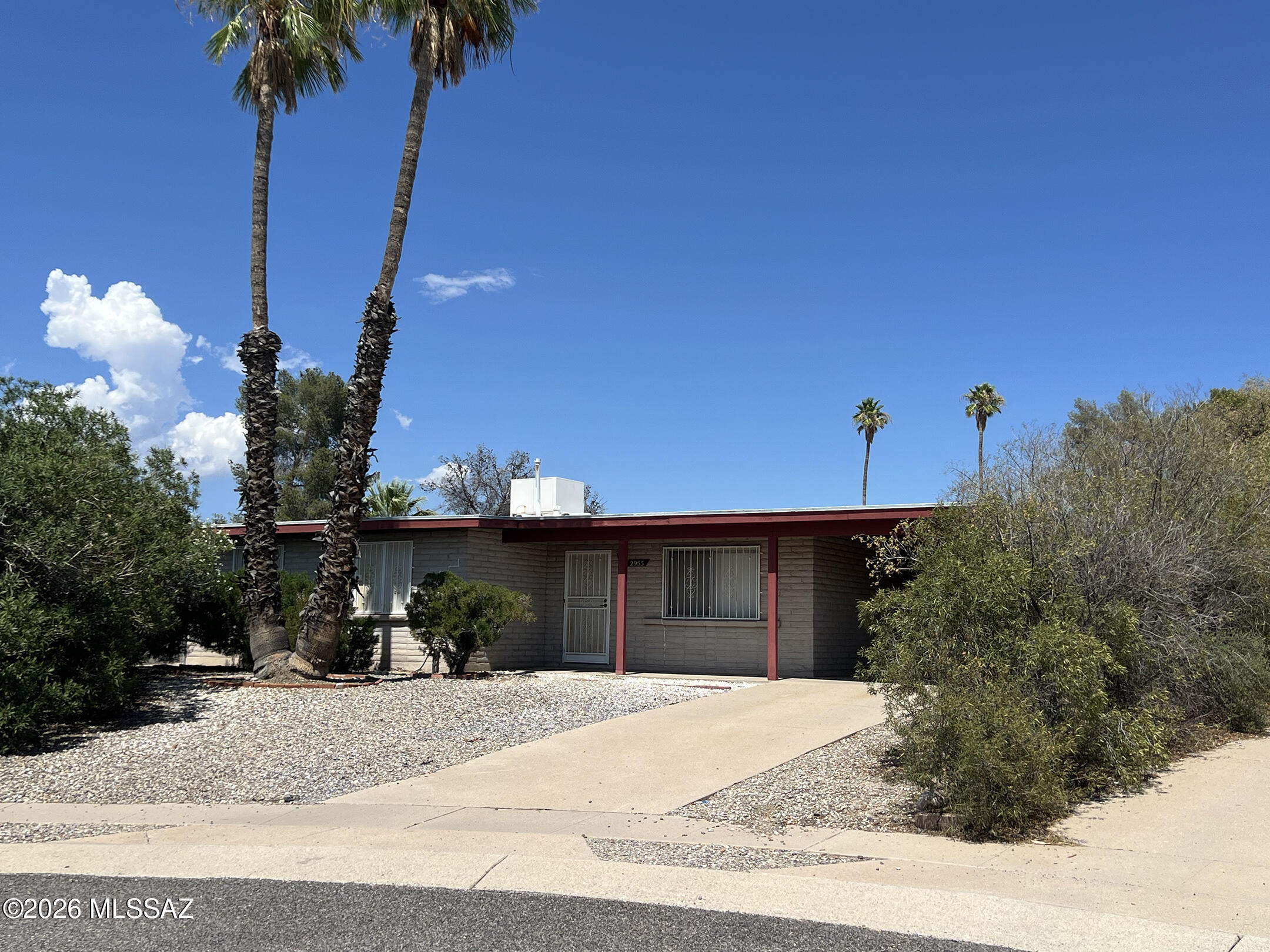 Charming, well-maintained 3 bedroom, 2 bathroom house sits back off the street on a Cul-de-sac.  Conveniently located near Davis Monthan Air Force Base, schools, transportation, shopping and restaurants.  Large, enclosed backyard. No HOA. No Carpet. Extra storage space available in carport.  A true gem in the heart of Tucson.  A must see!