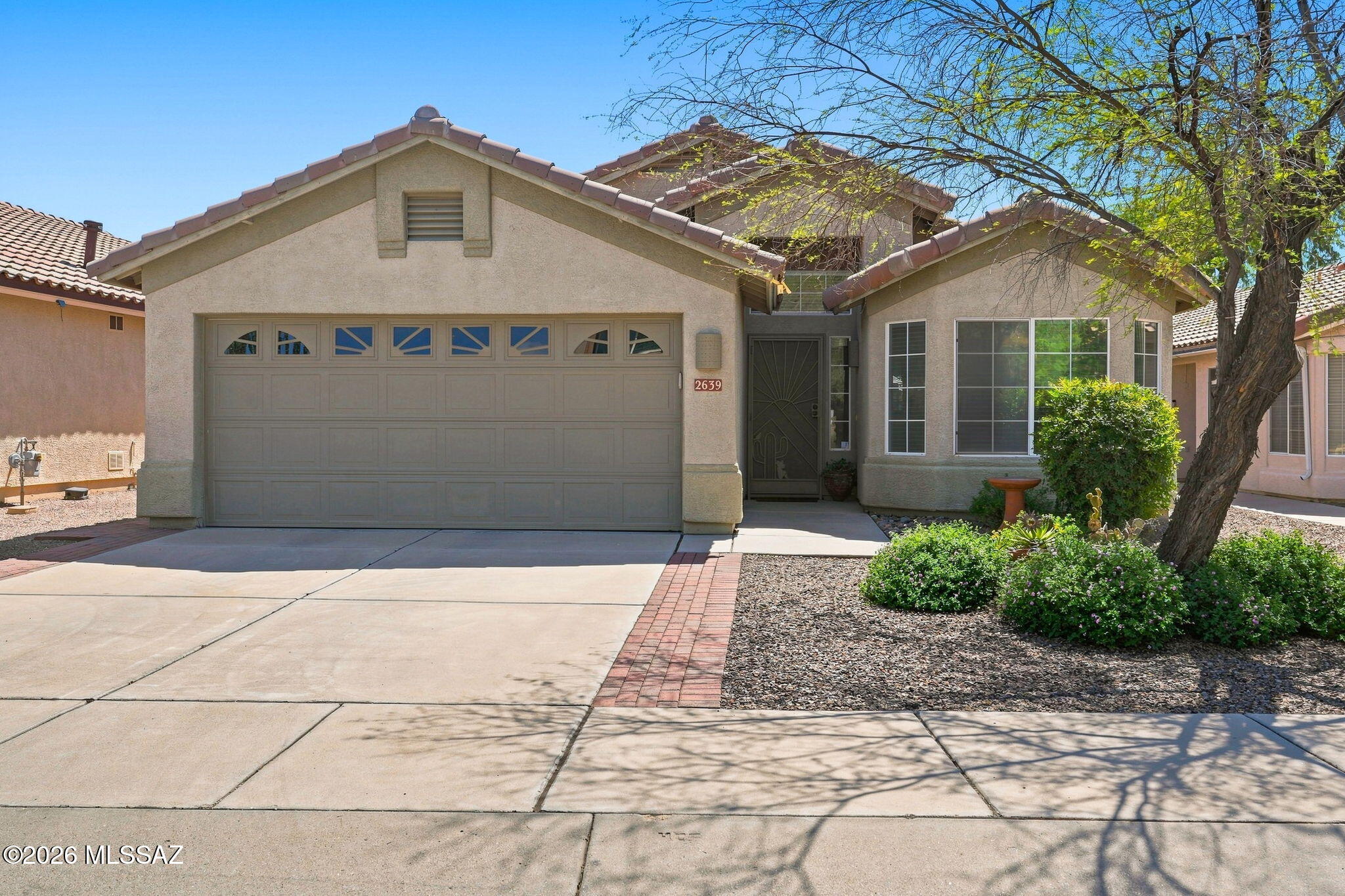 Discover effortless Southern Arizona living in this beautifully updated home in Northwest Tucson. Offering 3BD/2BA+Newer HVAC and Water Heater and (1,524 sqft) of living space, this home perfectly balances a private oasis feeling, with day-to-day convenience, all tucked away on a quiet, low-traffic cul-de-sac street. Pass through the welcoming foyer to find a light-filled open great room wrapped in a clean, neutral palette. The floor plan centers around a functional and updated kitchen, complete with an intimate breakfast bar, beautiful granite countertops, and a sunny dining room. The primary suite serves as an independent sanctuary, complete with its own private en-suite bathroom and a walk-in closet. Positioned thoughtfully are two additional guest bedrooms and a full secondary hall bathroom, ideal for a home office, hobby space, or accommodating guests. The indoor living spaces transition smoothly outdoors to a covered back patio and a fantastic backyard that has been upgraded with higher walls and professional landscaping. Tucked in a pristine pocket of Northwest Tucson, you can enjoy a tranquil setting with rapid proximity to retail centers, grocery hubs, and so much more.