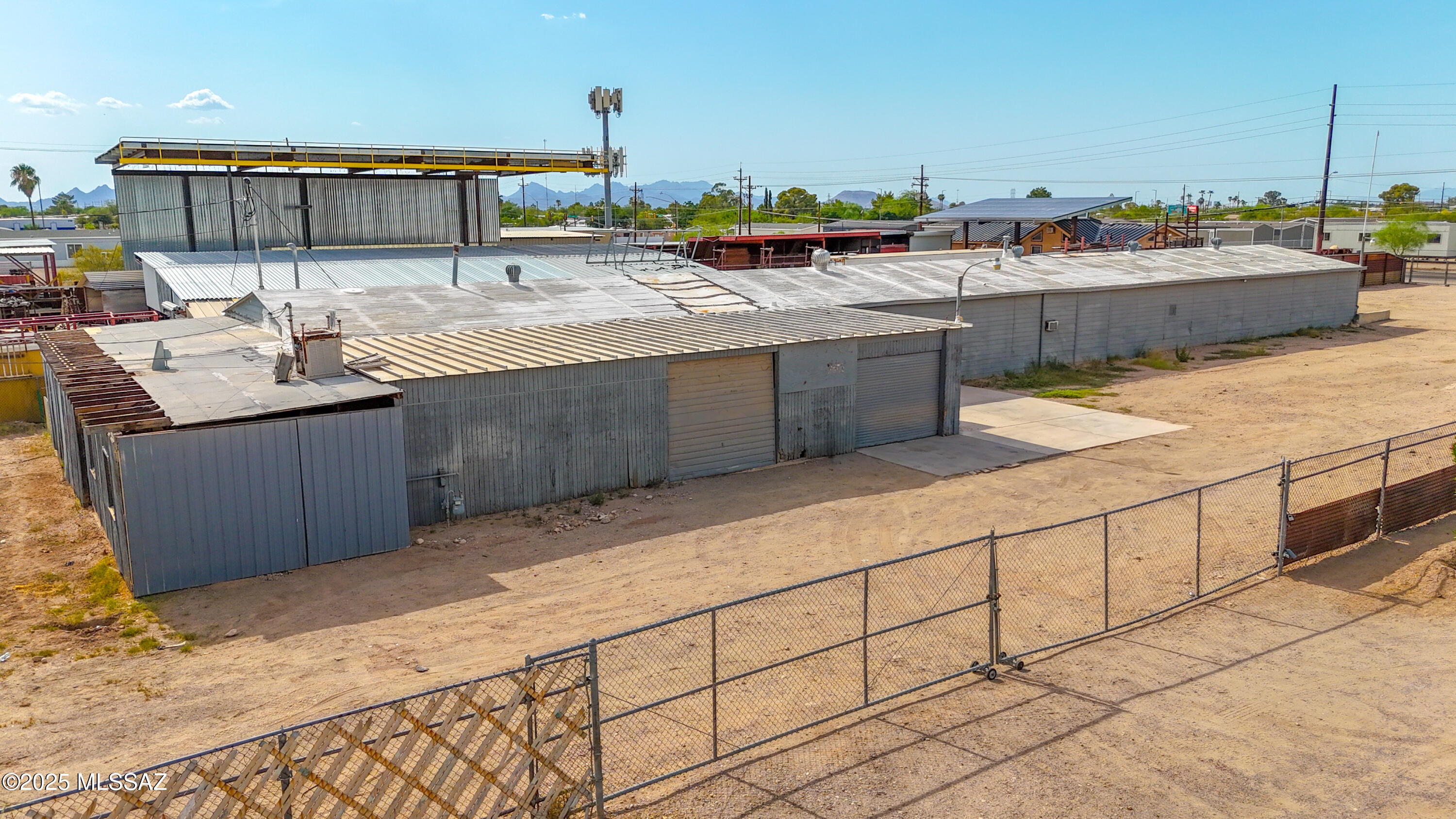 Excellent opportunity for contractors, landscape companies, storage, warehousing, and more. This versatile property features a fenced yard, a durable metal building, and double gates for secure and convenient access. Located near I-10 with easy freeway access. Zoned MU by Pima County with a 3020 Use Code for manufacturing, allowing for a wide range of industrial and commercial uses.

The spacious 29,446 sq ft lot offers ample room for parking, storage, and large vehicle access. Property is currently undergoing remodeling, making it an ideal time to customize it for your specific business needs.