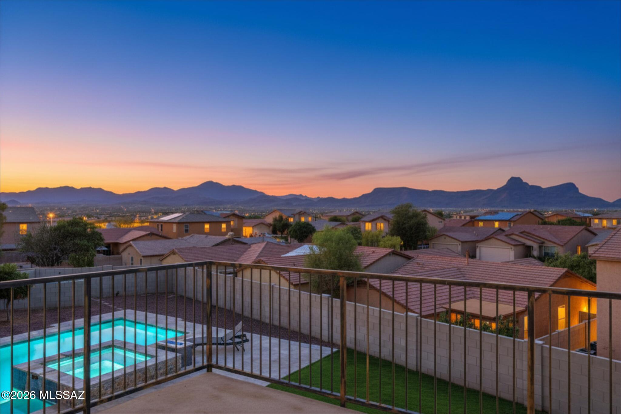 Highly desirable Hartman Vistas neighborhood. 4 bedroom 2 and a half bath home. One of the largest lots in the neighborhood. This home sits elevated above the neighbors behind to provide privacy in the backyard and views of the Tucson Mountains. The sparkling pool and spa are heated and just built in 2019. The backyard is an entertainer's dream with lots of space, artificial turf, and putting green. Solar lease provides drastic savings on the power bill. The kitchen includes a large single basin sink, stainless steel dishwasher, stainless steel double electric oven/ range, stainless steel microwave and large walk in pantry. The master bathroom features double vanity, walk in shower, and separate garden tub.