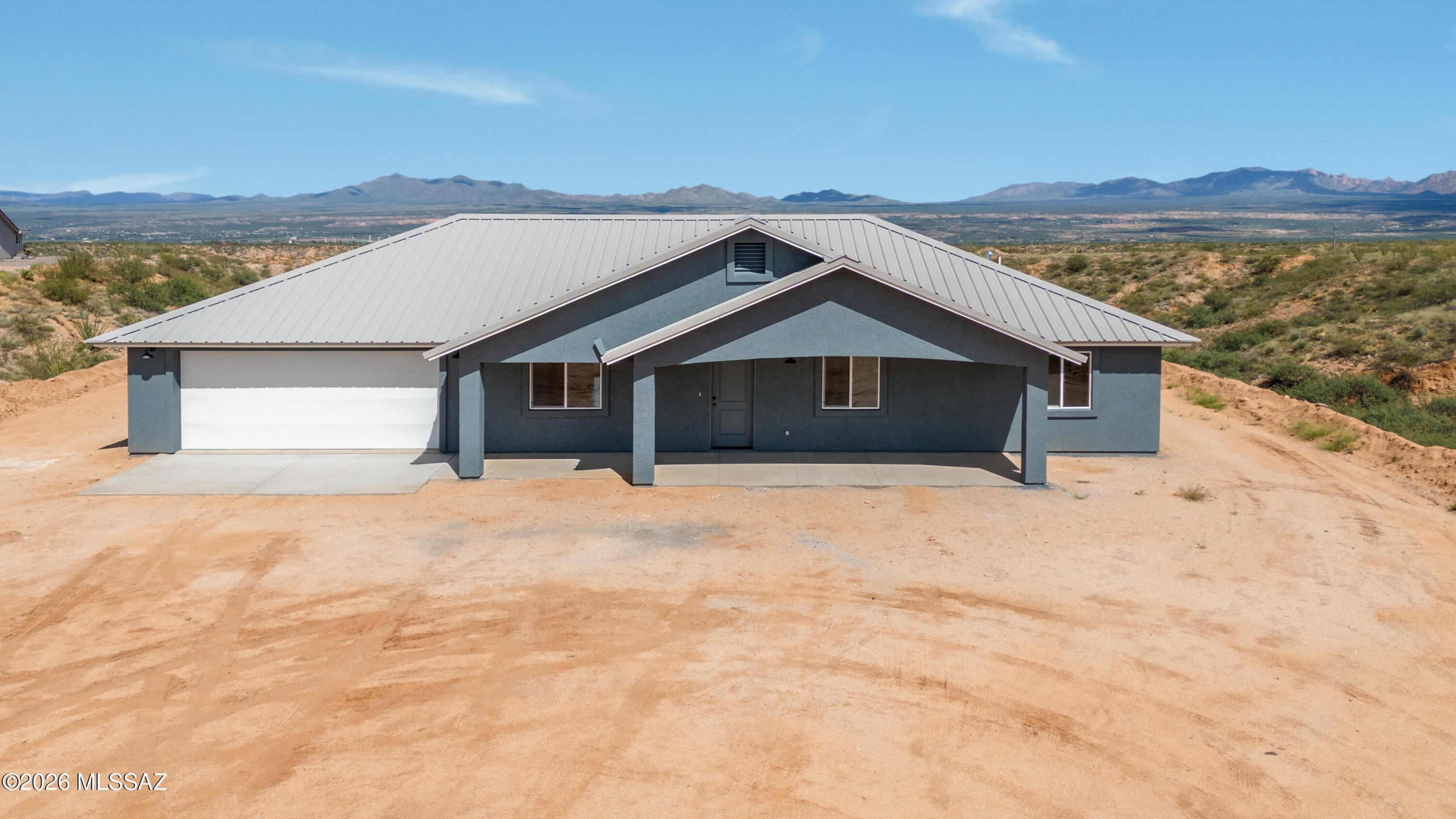 NEW CONSTRUCTION. Your dream home awaits on 2.34 acres with gorgeous views. Custom Features include: Split Floor Plan, High efficiency vinyl windows, Vaulted ceilings, covered patios, Spacious kitchen with hardwood cabinets, Work island and so much more. 30 minutes from Tucson or Sierra Vista.