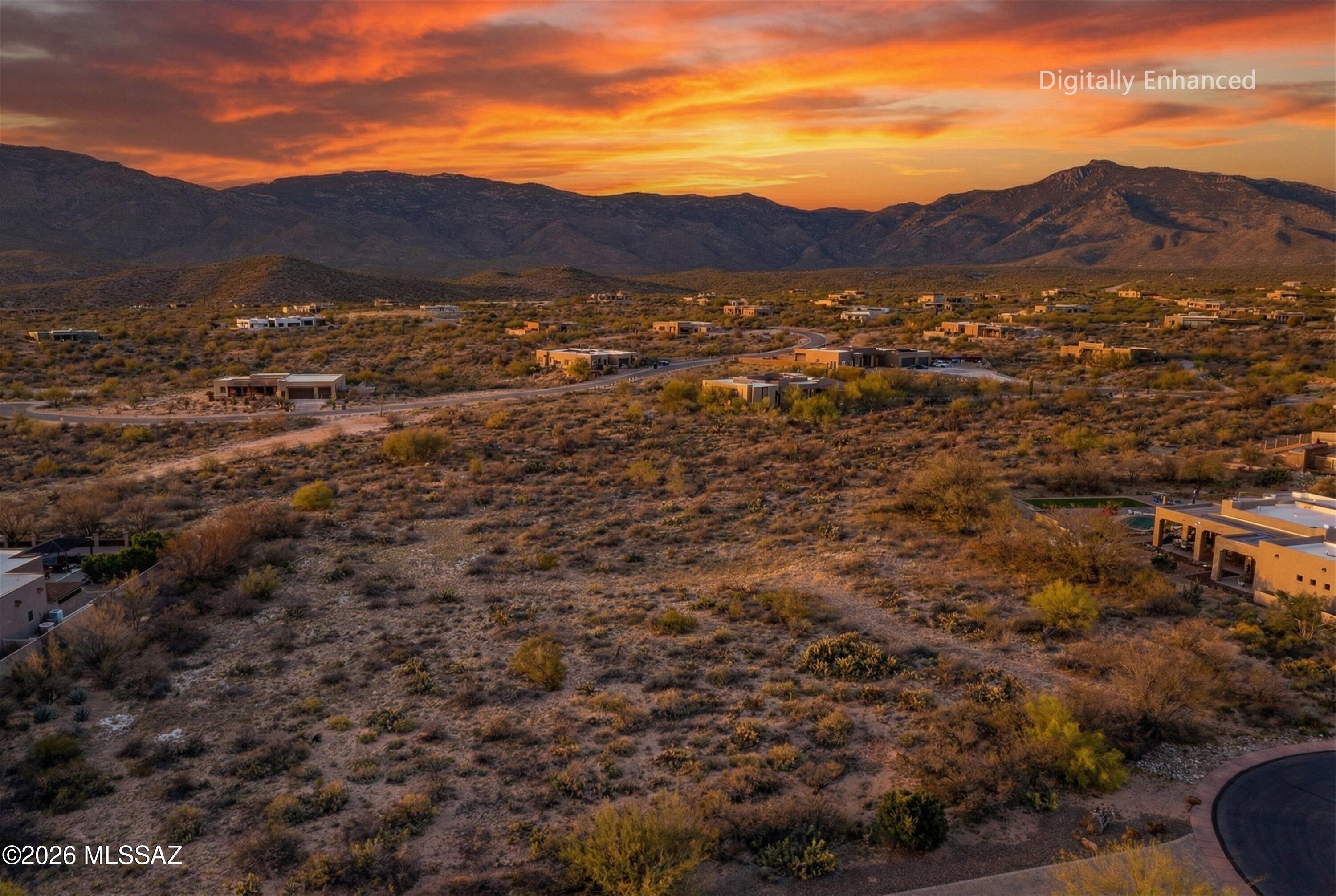 Build your dream home on this 1.43-acre homesite in the gated Coyote Creek community in Vail's Rincon Valley. Enjoy fantastic mountain and desert views, peaceful surroundings, and the privacy this sought-after master-planned neighborhood offers. Opportunity #1: Partner with owner/builder of lot to build your home with plans tailored to this homesite. Opportunity #2: Purchase the lot and bring your own builder. Opportunity #3: Utilize site plans already designed and platted for this lot (plans not included with purchase). Over $5,000 in preliminary lot development has already been completed, helping streamline the building process. Residents enjoy equestrian privileges, miles of scenic trails, and a recreation center with pickleball, tennis, basketball, playground, and BBQ areas.