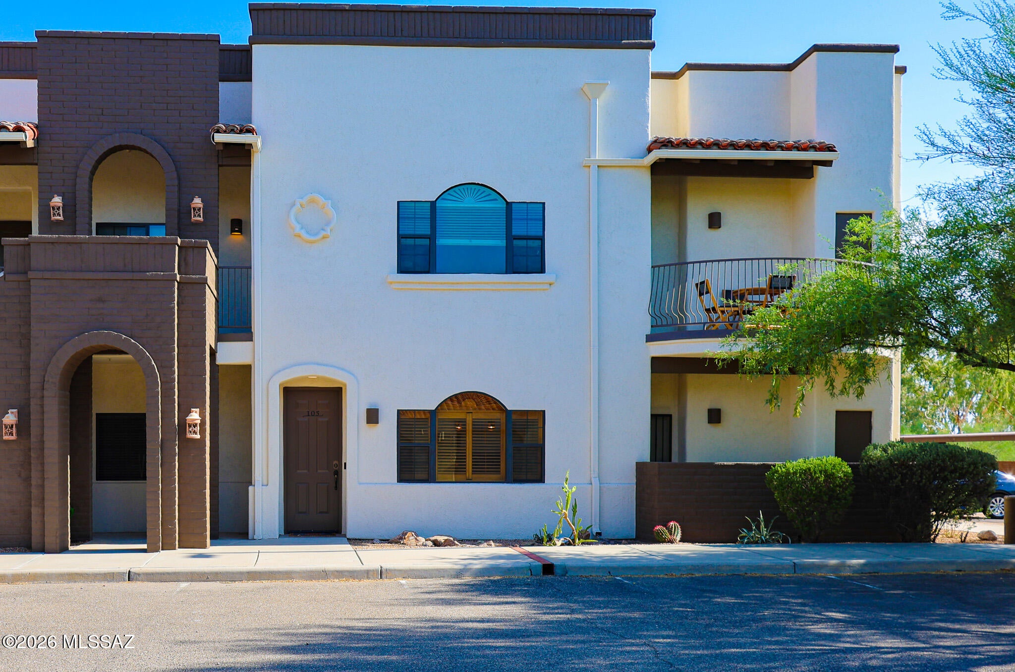 Move in ready in the gated Placita Escondida community! This beautifully updated 2-bedroom, 2-bath condo is just steps from the Rillito River Path and St. Philip's Plaza. Features include polished concrete floors,  fresh interior paint, quartz countertops, a stylish tile backsplash, breakfast bar, stainless steel appliances, and a dedicated laundry room with washer and dryer included. The spacious primary suite offers a walk-in closet and updated en-suite bath with a dual vanity. Enjoy two private patios-one off the living room and one off the primary bedroom. Conveniently located near shopping, dining, and the Riverwalk.