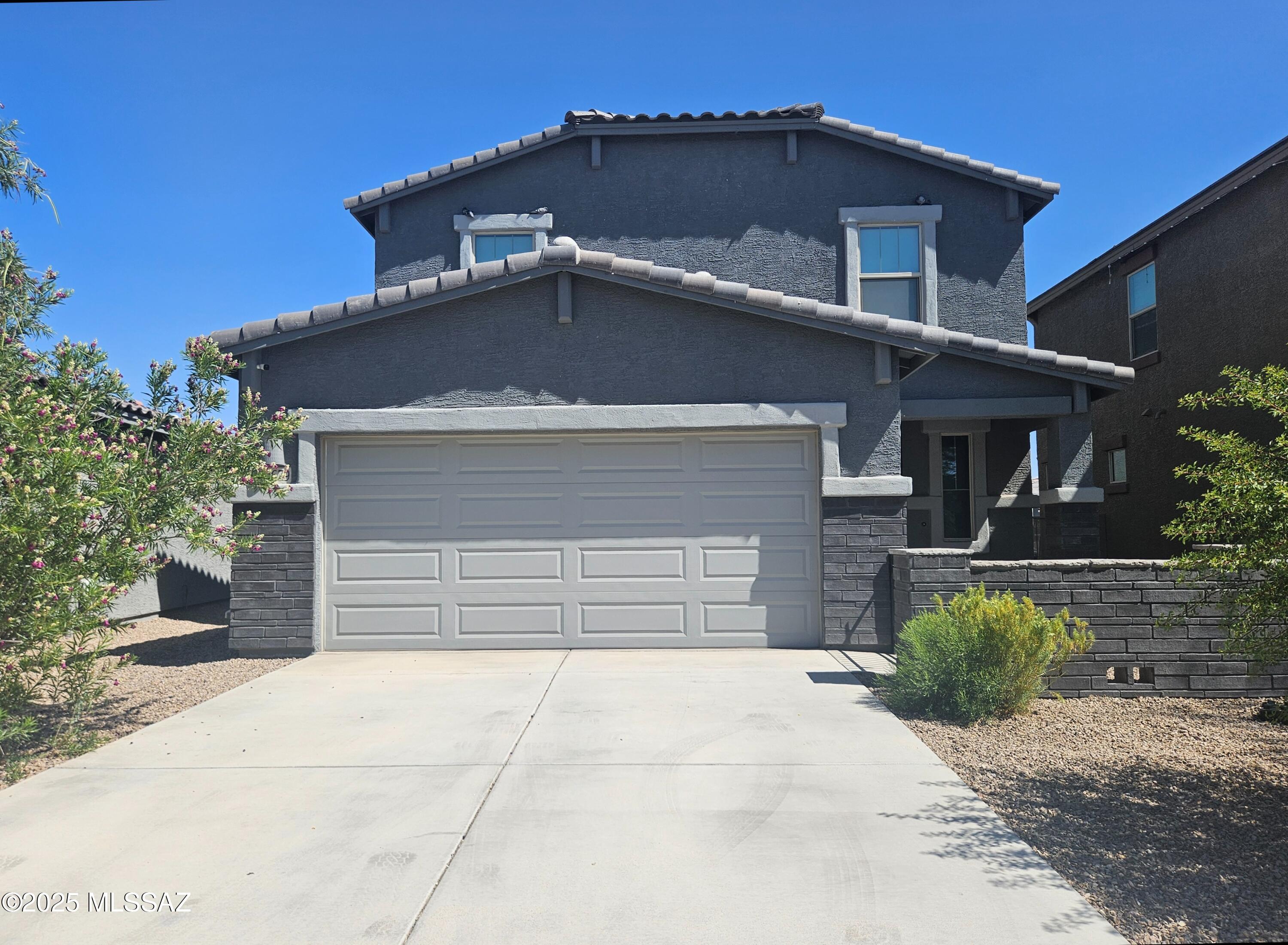 Enjoy comfort and style in this 4-bedroom, 3-bath rental home that features a bright open floor plan, a versatile upstairs loft perfect for a home office, playroom, or second living area, a kitchen with granite countertops and tile backsplash, a spacious walk-in pantry, and a large island perfect for easy meal prep and gatherings. The backyard is a true highlight featuring pavers, artificial turf, a hot tub, and a private mini-putting green for year-round fun. Enjoy living in a great community conveniently located near I-10, local shopping, and schools. Schedule your showing today and see all this home has to offer! Washer and dryer included. Pets on approval with an additional deposit.