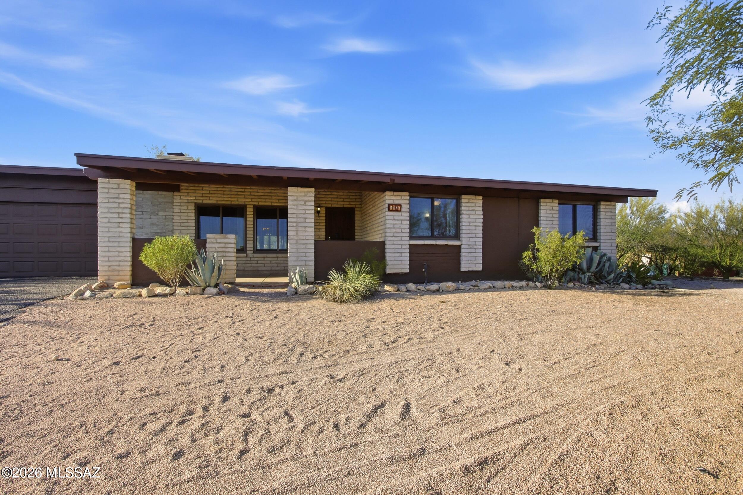 This home is nestled on an elevated .83 acre view lot! Granite kitchen w/ granite backsplash & SS appliances! Both bathrooms feature Travertine bath/shower enclosures, engineered granite-like tops & brushed nickel hardware! 36x16 shop/studio/office w/ heater/AC, water, laundry tub, epoxy floor and electrical. 2nd out building is approx 10x15, Great mountain Views from front & back patios!