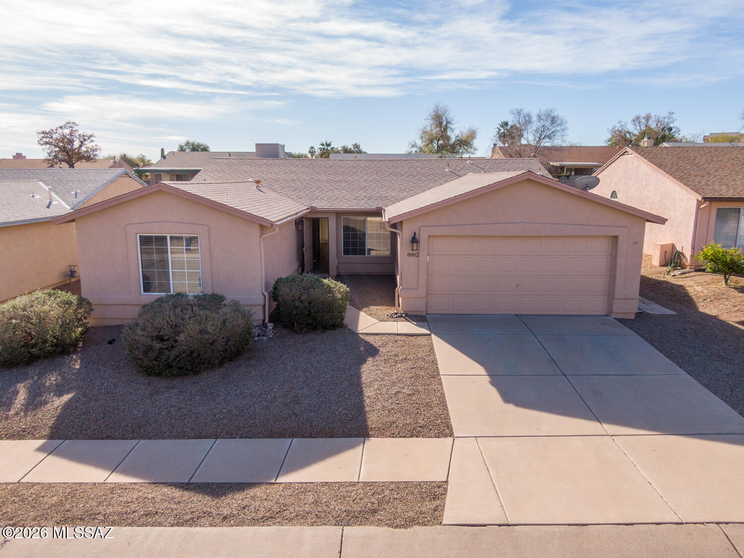 Incredible and Rare find in this popular Eastside neighborhood! Meticulously maintained 4 Bedroom/ 2 Bath with many recent upgrades. Kitchen features custom solid alder wood cabinets with pullout drawers, 42'' uppers, high-grade granite and a new refrigerator. Master Bath and Closet remodel. Split floorpan, 18'' designer tile flooring in living areas. Cozy wood burning fireplace in the family room. Enjoy this relaxing and easy care backyard with stunning Rincon Mountain views! This home is just minutes from shopping, Pima Community College, Davis Monthan Air Force Base and local parks. Come and see!!