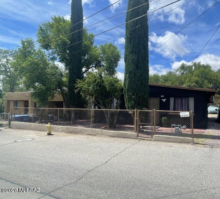 Centrally located home in Nogales. This move-in ready property has been recently remodeled with laminate floors, interior paint, new kitchen cabinets and granite countertops, ceiling fans, upgraded led light and plumbing fixtures. It offers a spacious rear yard with two storage sheds. Conveniently located near schools, shopping, and downtown restaurants.