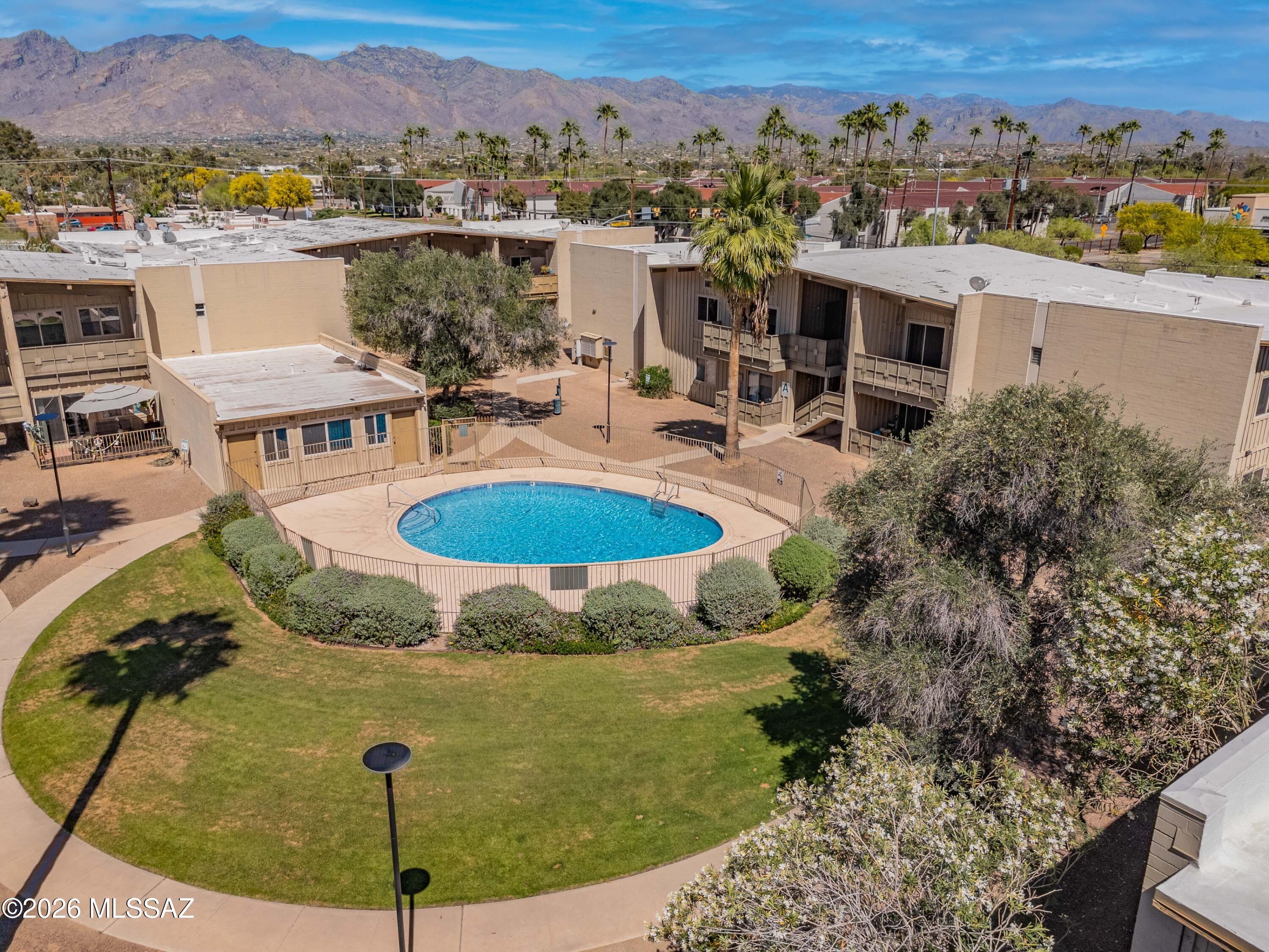 Perfect location in the community, front door leads right out to the pool, laundry included in the unit, no carpet, outdoor patio, all appliance included. Low cost opportunity, check it out today!