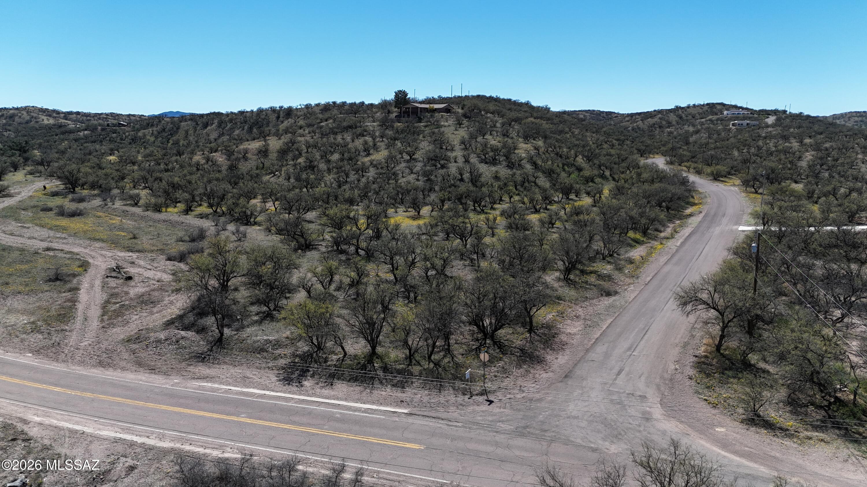 A portion of the 3.23 acre lot is in a flood zone but the majority of the lot is not.  See the flood zone map under the documents tab.  Electric and water are at the street.  Paved roads.  Located about 1.5 miles from the shopping center.