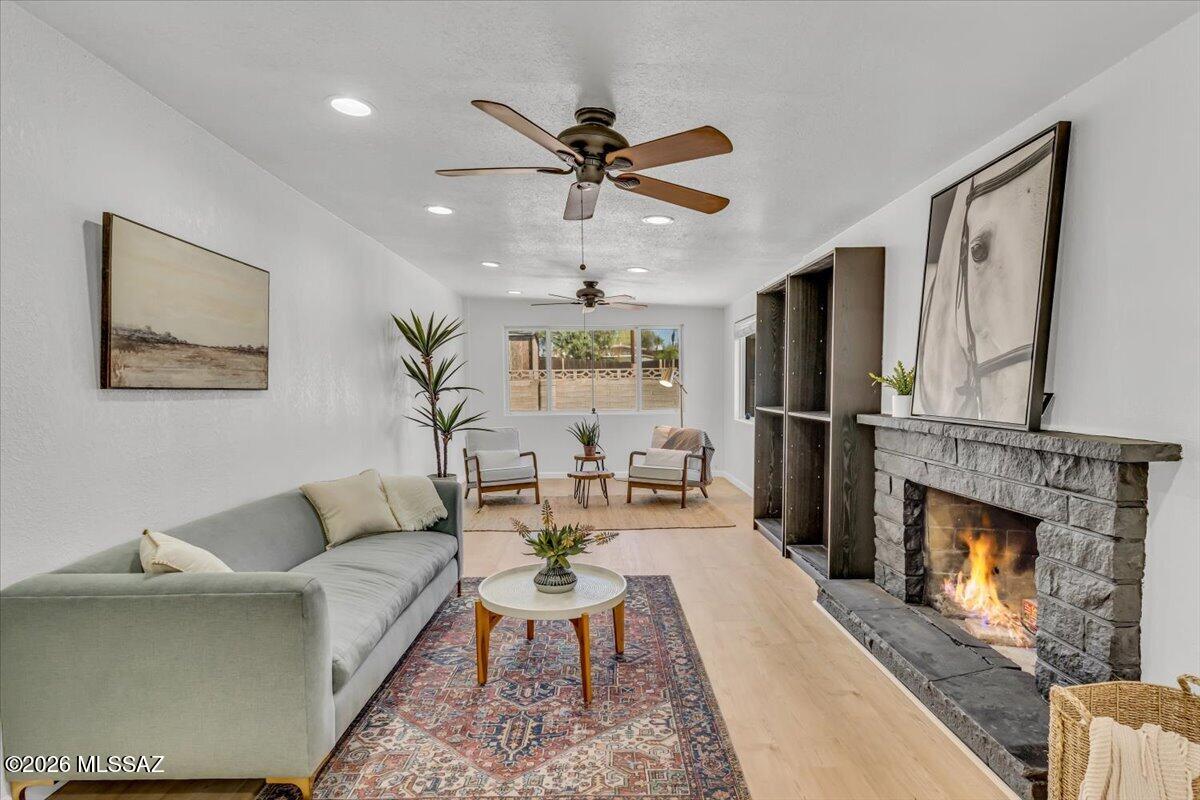 !!! 2.99% ASSUMABLE LOAN for qualified buyers**** Renovated, move-in ready, and set on a HUGE lot with NO HOA! This 4-bedroom, 2-bath tri-level offers 2,105 sq ft with a functional split floor plan and a private downstairs primary suite, while the additional bedrooms are upstairs. Fresh flooring, new carpet, and interior paint give the home a clean, updated feel from the moment you walk in. Located on a cul-de-sac on the East Side, the oversized lot features an RV gate and plenty of room for parking, storage, entertaining, recreation, or future possibilities.