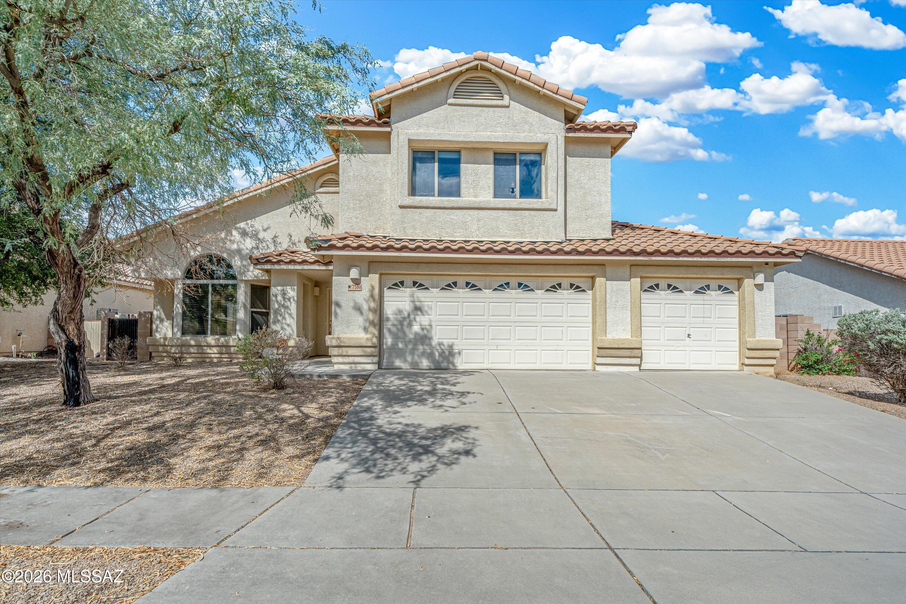 THE SELLER WILLING TO PAY OFF EXISTING SOLAR BALANCE AT COE WITH ACCEPTABLE OFER- 
New energy efficient roof installed in 2025 and EV charger in garage. Spacious two-story home in the desirable Star Valley community of SW Tucson! 2,909 square feet, 5 bedrooms and 3 full bathrooms. This home features a bright open floor plan with soaring vaulted ceilings and plenty of space to gather. A large bedroom and full bath downstairs.. Upstairs, the primary suite features a private balcony with beautiful mountain views. Step outside to a low maintenance backyard with artificial turf, perfect for relaxing or entertaining. A spacious and versatile home ready for its new owners!