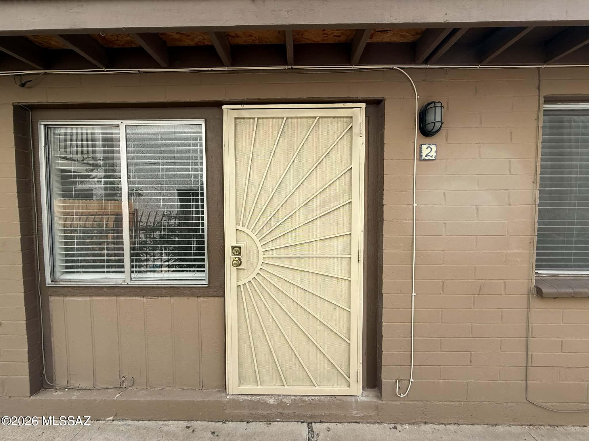 Charming 1BR/1BA apartment located in a small gated community of 10 units n central Tucson. This cozy 550 sq. ft. unit is perfectly situated near Davis-Monthan AFB, shopping, schools, parks, and more. Central AC to keep you cool during those long hot summers. The home features tile floors throughout and vaulted ceilings. The kitchen comes equipped with a refrigerator and stove/oven. On-site coin-operated laundry is available for your convenience, and off-street parking is included. Pet-friendly, this home provides comfort and accessibility at an affordable price. Don't miss out, call today to schedule a viewing! Section 8 allowed.