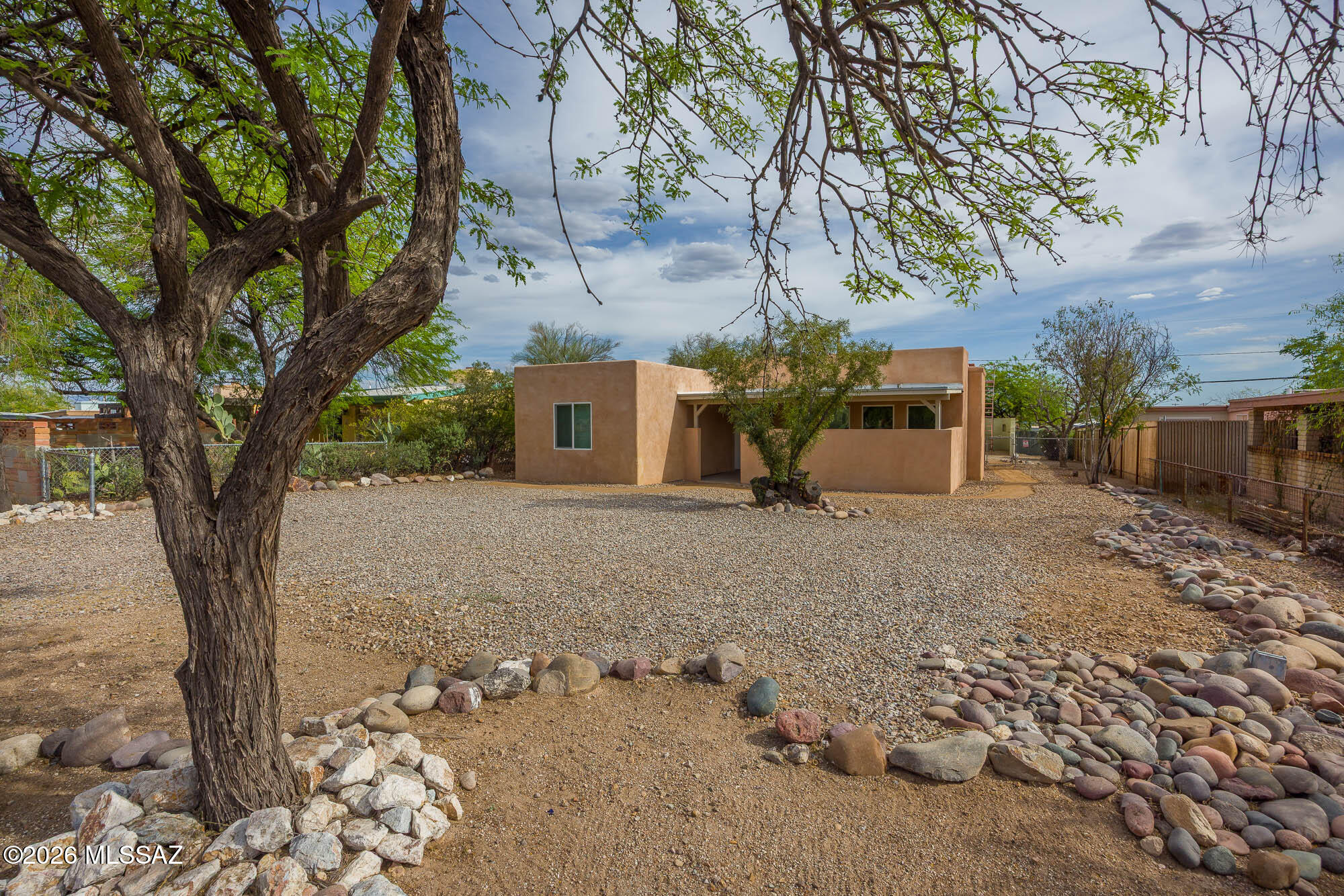 Original 1947 home, updated, and expanded with detached ''studio'' Casita on R2 Lot!  Main home 4BR/2BTH. Split BRM design. Courtyard entry. Large main living room w/ fireplace, Dual pane windows and good natural light. Updated kitchen and baths. Each BRM wing has EZ private access to yard areas. The design of main home and Casita location opens the possibility of ''live in/rent options'' to advantage the R2 Lot zoning. Casita; an open studio plus Bath design. Main home and Casita have Separate utility meters. Ample front parking from Waverly for main home. Access to a rear ally that can be configured with a gate design for owner or Casita resident parking.
