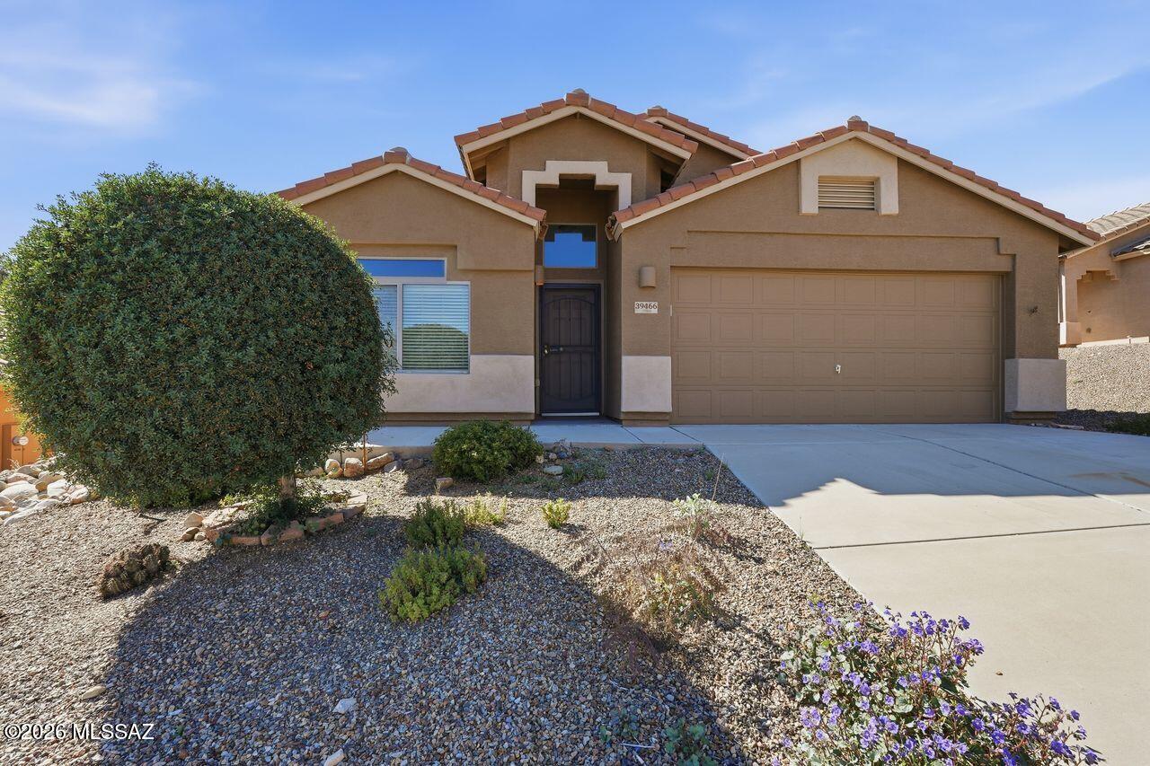 Great Value in Eagle Crest Ranch! Sited on an elevated & oversized lot, this comfortable open concept home features a blend of casual and formal spaces and is ready for its new owners. 
Interior of the home features abundant light, split bedroom plan and spacious rooms.  Enjoy relaxing or entertaining in the park like back yard setting.  The private expansive back yard space offers mature shade trees and desert plantings with room  to add additional patio, seating, play equipment or a swimming.  Seller has had the home painted inside and out, with newer AC and water heater in 2024-25. 
Great street appeal...lovely mountain views. Truly a wonderful place to call home! Just move right in!  You'll never want to leave!