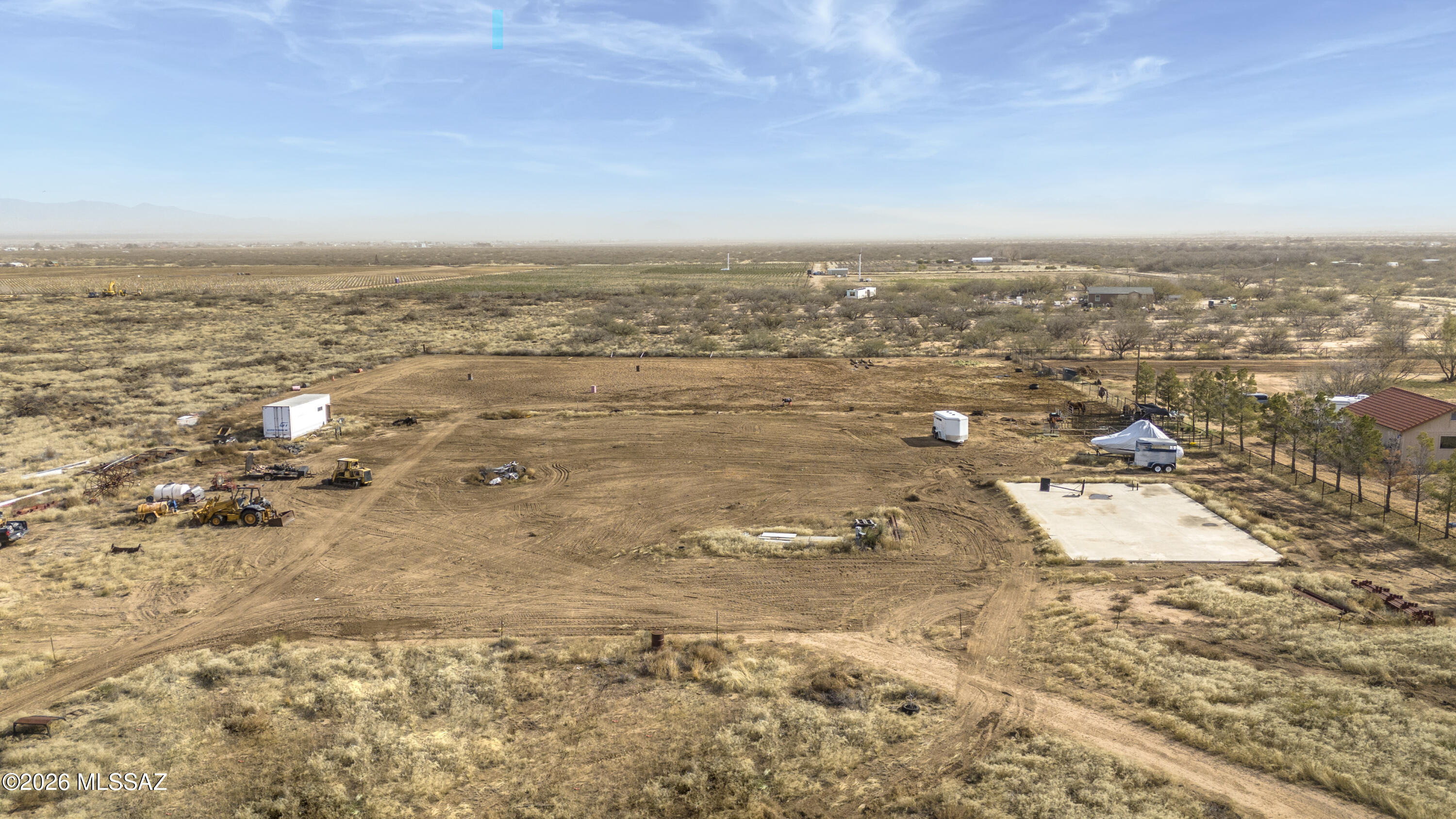 Build your dream Barndominium! ''Some Assembly Required''.  4 acres of flat useable land with beautiful views of Cochise Stronghold. Property includes 1/4 well share, 200 amp electric, septic installed, Concrete pad is poured and ready for a 40X60 Muller Metal Shop that is included (building is not erected).