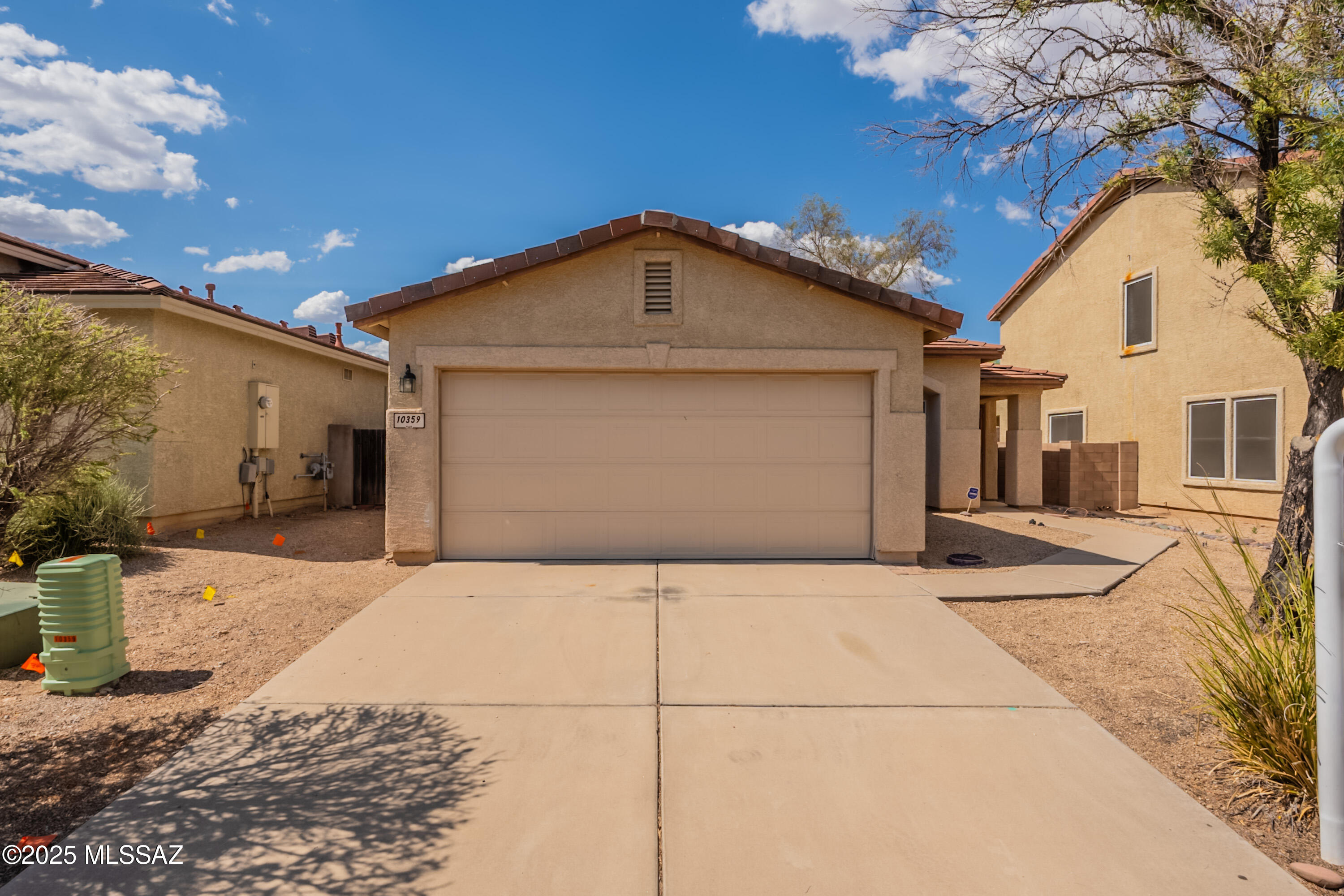This beautifully updated 2-bedroom, 2-bath home in a prime location is move-in ready with fantastic recent upgrades! Enjoy peace of mind with a new roof (2021), new appliances, new washer and dryer, new toilets, and brand-new carpet (2025). The thoughtful split-bedroom layout offers privacy, with a versatile den/office in between. The stylish kitchen features Corian countertops, a glass block backsplash, and a spacious island. Step into the screened-in porch and out to a charming backyard with pavers, decorative rock, shrubs, a fruit tree, and a built-in BBQ - perfect for entertaining! Located in a vibrant community with pools, a basketball court, walking trails, and more, plus easy access to shopping and dining. Don't miss this one!