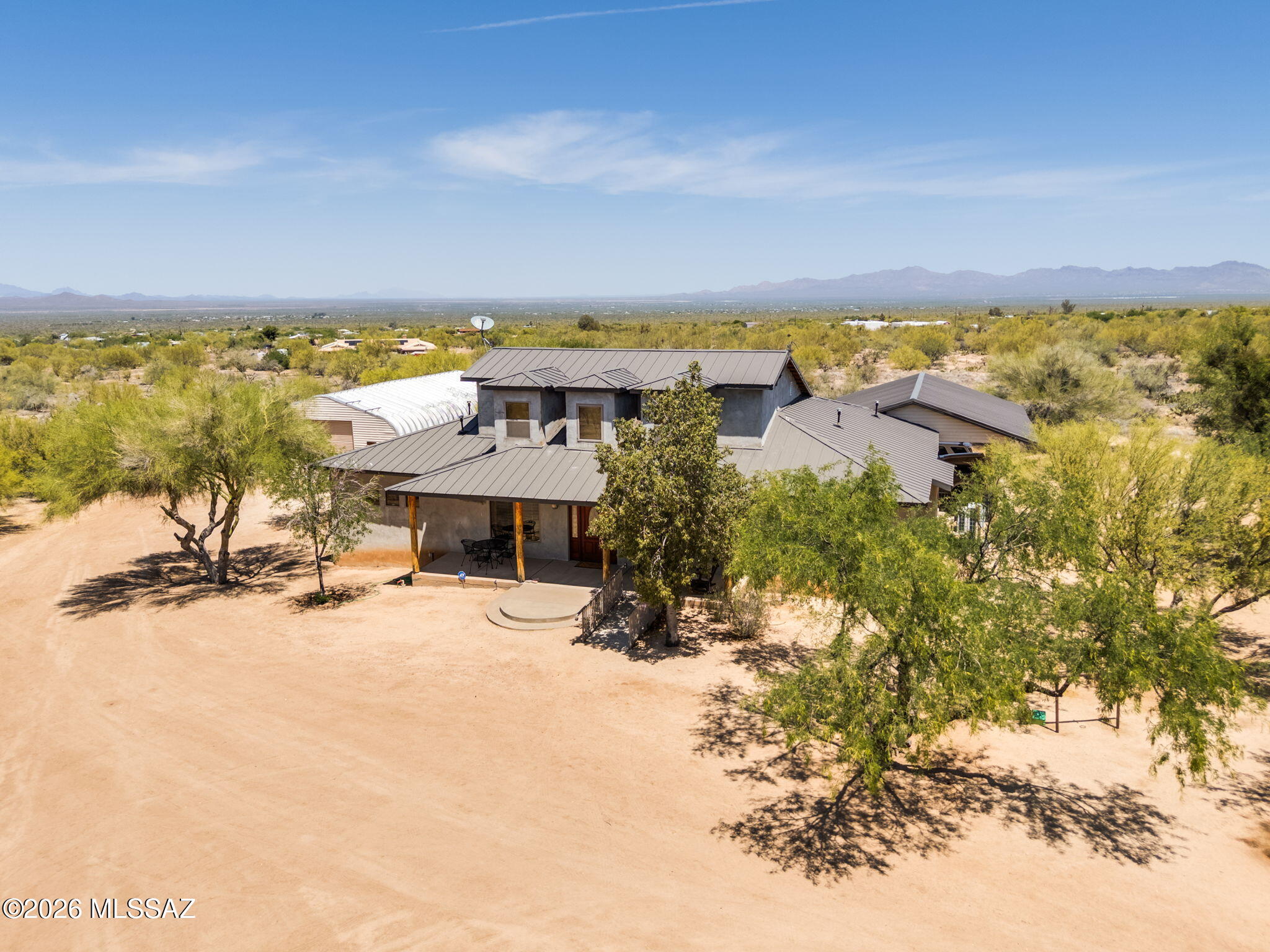 Welcome to this spacious desert retreat. Situated on over 4 acres and zoned for horses, this impressive 3,000+ sq ft home offers room to live, work, and play. The home features 3 bedrooms, 3 full bathrooms, and 2 half baths, along with a versatile loft and basement providing flexible space for entertainment, guests, or a home gym. Equestrian and hobby enthusiasts will love the RV garage complete with a full bathroom and full hook-ups, plus two covered carport spaces for additional parking. Major updates offer peace of mind with a recently replaced well and new HVAC/furnace system. With expansive land, functional amenities, and endless possibilities, this unique property is truly a must-see!
