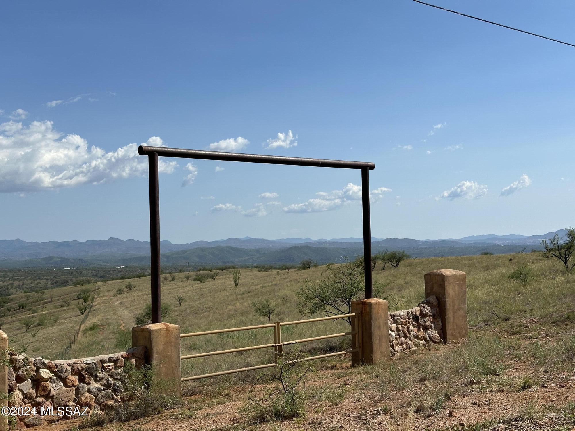 One of the most beautiful 36 acre horse properties in all of Lake Patagonia Ranch Estates !! Has 360 degree mountain views, rolling hills, flowing grass, trees, private well, decorative windmill, utilities to lot line !! There are several really nice building sites to build your dream home!  Beautiful Lake Patagonia, town of Patagonia, Sonoita and Elgin are all nearby... Truly one of a kind !!