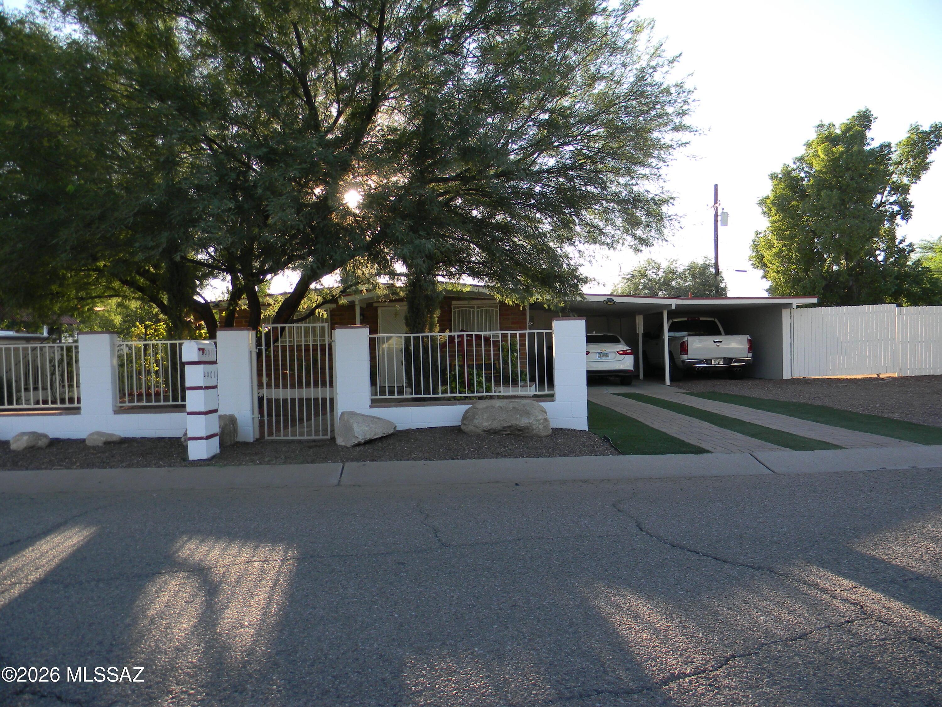 Great Starter home, Large lot with room for RV parking. Pride of ownership, Front yard has block wall with wrought iron fence many planters and gravel through out front and back yard. Gazebo in back with storage shed. many fruit trees and shade trees. freshly  painted inside and out. wood beams though out home. wrought iron security bars with releases in bedrooms.