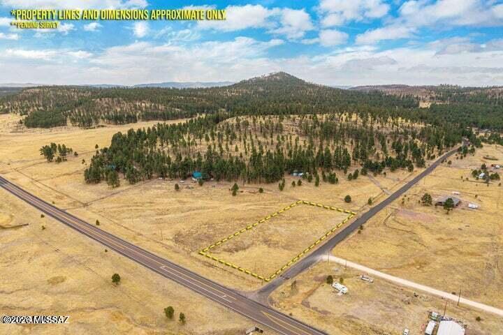 s: *** ADDED ACREAGE*** UNRESTRICTED NO HOA*** Prime 5.18-Acre Parcel Near Luna Lake - Endless Possibilities! Don't miss this rare opportunity to own a centrally located, flat 5.18-acre parcel with frontage along US Highway 180 and the scenic Blue Road. Enjoy sweeping panoramic views and direct proximity to beautiful Luna Lake--an ideal setting for your dream home, cabin, or investment With no HOA restrictions, this property offers unmatched flexibility and potential. The seller is open to seller financing options making it even easier to make this stunning piece of land yours.

Please note: There is currently no water, septic, or sewer in place. Buyer will be responsible for utility installation and connections.

Whether you're seeking a peaceful retreat or a smart investment, this property is full of potential and ready for your vision.