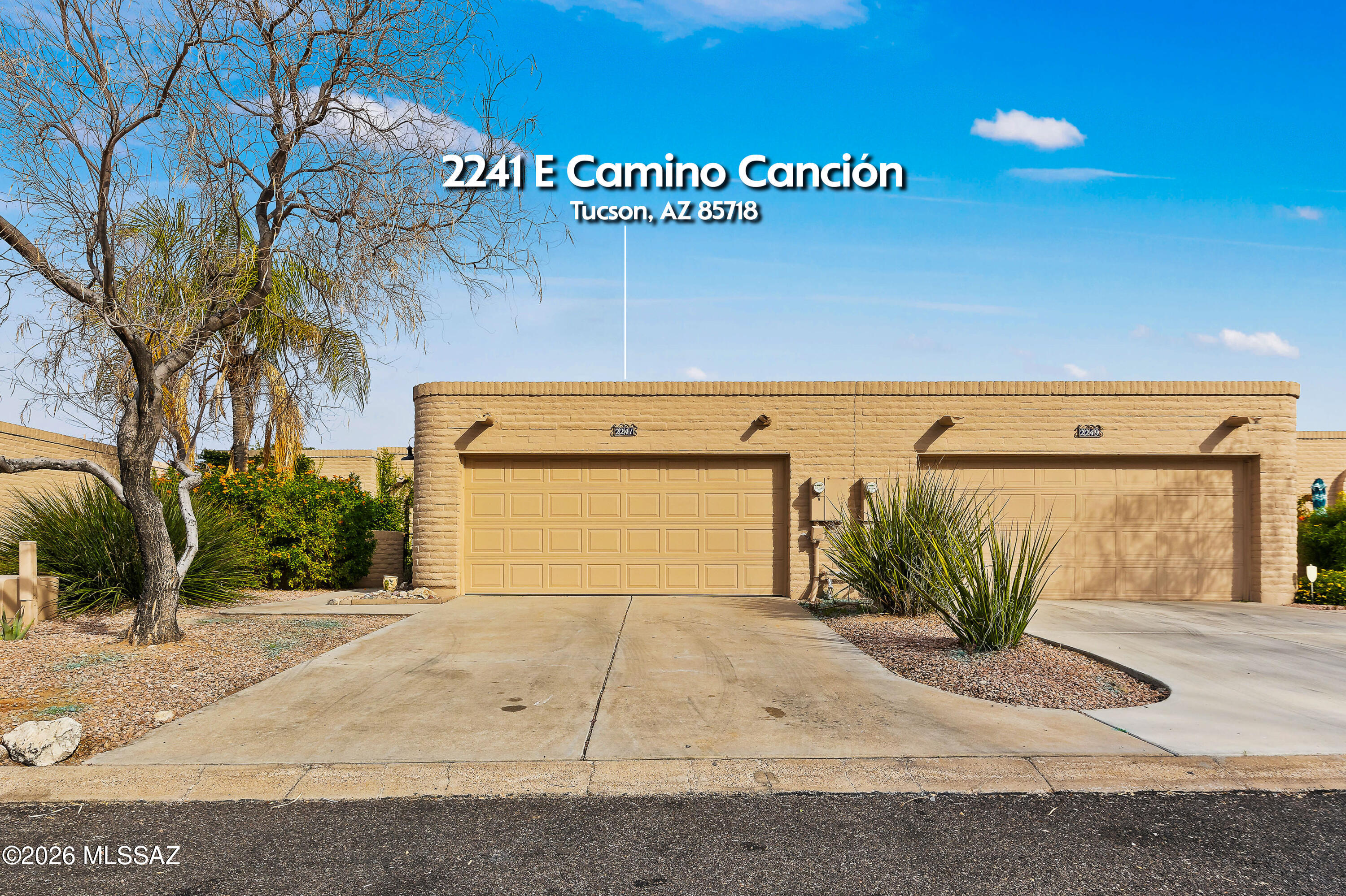 Gorgeous Remodeled Townhome in prestigious Rio Cancion community * * single level * 1425 sqft * 3 bedrooms * 2 bathrooms * Freshly painted interior *  brand new hardwood laminate flooring throughout the home w / new baseboards * new garage door and garage door opener * AC unit 2021 * water heater 2020 * fresh roof coating 2021 * new roof installed 2019 * newer black refrigerator and dishwasher in 2024 * beautiful community pool area * HOA covers water, sewer, trash, streets and clubhouse/pool maintenance * highly desirable Rio Cancion community * cozy covered back patio * conveniently located to the Foothills and Midtown * 2 car extended driveway.