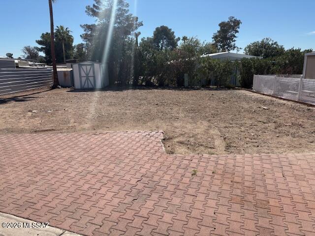 Great north facing vacant lot with all the utilities at the property with great mountain views!  This lot has been cleared and is ready for a new home. The owner also removed a couple of trees to make room and left the sheds. This is your opportunity to select a new home and have it placed on the lot. Located in an active 55+ community, the HOA fee includes unlimited golf, tennis, pickleball, shuffleboard, pools, spa, fitness center, trash service, and much more. Best of all--you own the land. This is carefree living at its finest.