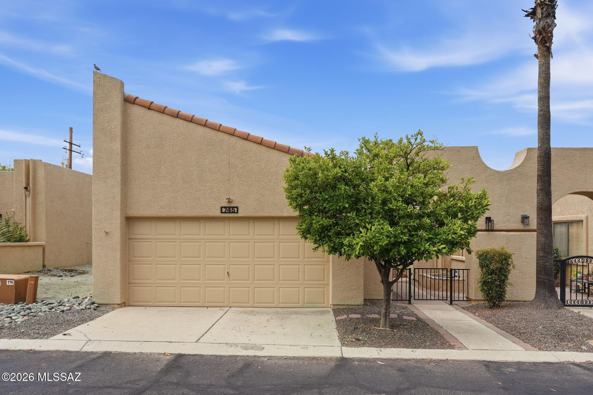 Welcome to Sunset Ridge Townhomes! This 2-bedroom, 2-bath home offers 1,417 square feet of comfortable living with a spacious 2-car garage and a cozy fireplace that's perfect for relaxing evenings.

Enjoy peace and privacy with no rear neighbors, along with the convenience of a newer HVAC system, and a brand-new roof for added peace of mind.

The vibrant community offers exceptional amenities, including two sparkling pools, a spa, clubhouse with organized activities, library, and fitness center--making it easy to enjoy an active, low-maintenance lifestyle.

Ideally located near shopping, restaurants, and entertainment, this home combines comfort, convenience, and community in one desirable package