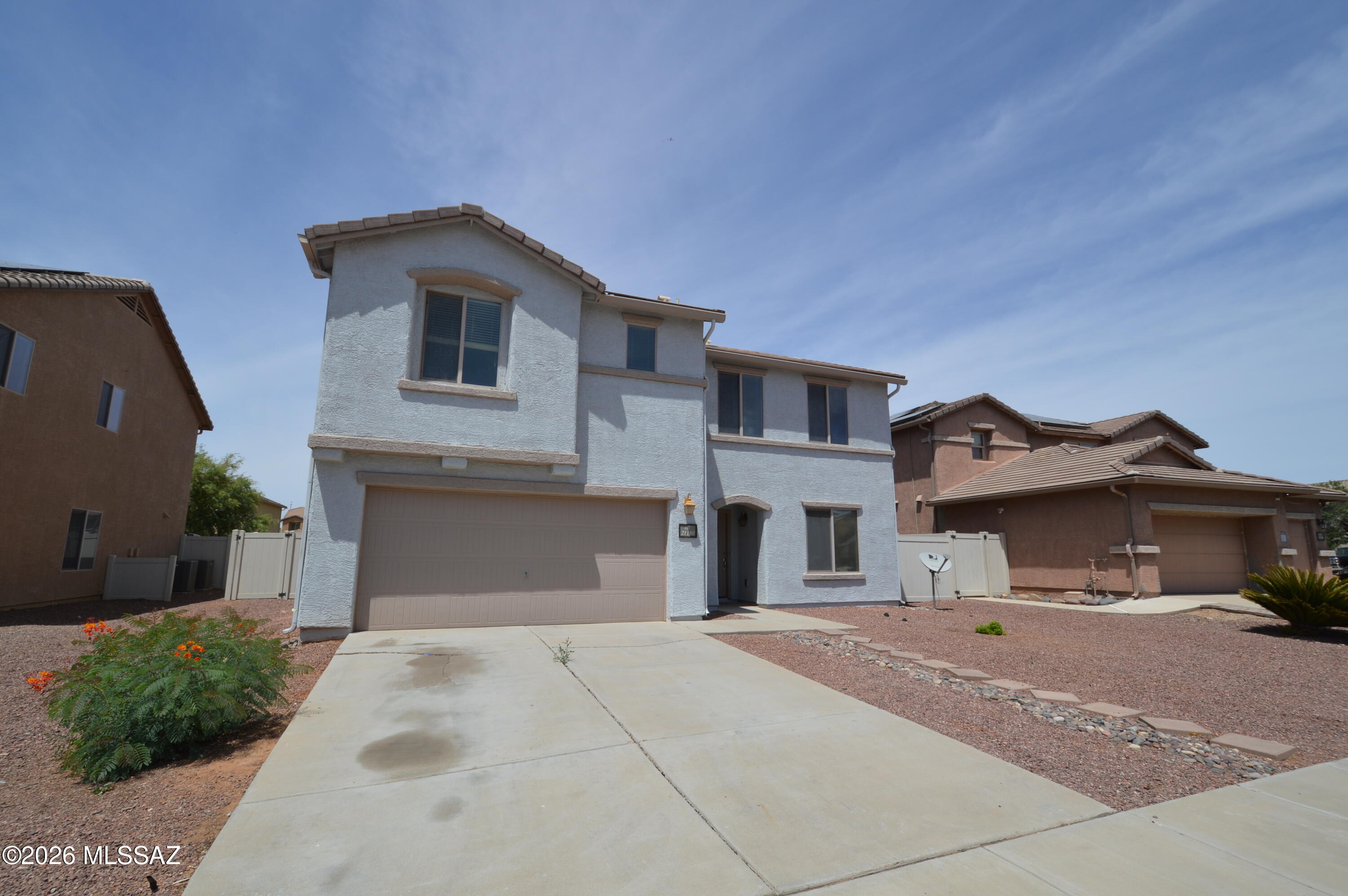 Absolutely FANTASTIC 3 BR in Red Rock! Enormous 2-story home has tons of space to really spread out! Downstairs has both a wide-open living area and an open space that could be a home office! Upstairs is home to the luxurious master suite, 2 large secondary bedrooms and a spacious loft area! Well equipped kitchen with island! HUGE walled backyard with covered patio! Don't miss out on this one! SEE IT TODAY!