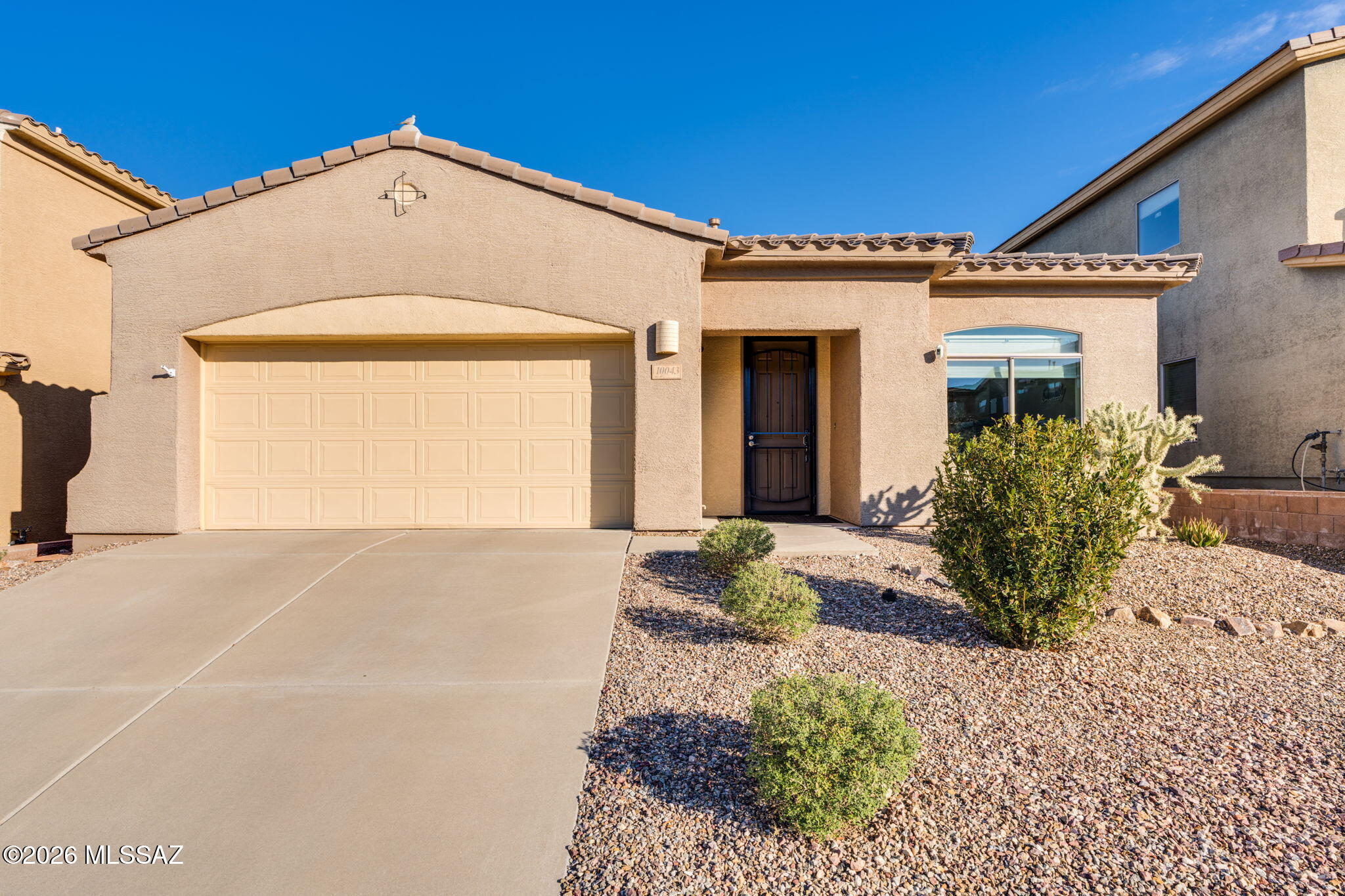 Beautifully updated 4-bed/ 2-bath home featuring updated flooring & paint throughout. Bright, open layout filled with natural light. Spacious great room flows into a large kitchen with an expansive island/breakfast bar--perfect for gathering and entertaining. Primary bedroom offers a walk-in closet, dual vanity, custom tile shower, and a private entrance to the screened-in Arizona room. 2 car garage finished out with epoxy floors, shelving, and utility sink. Beautifully landscaped backyard designed for relaxation and entertaining, Featuring artificial turf, desert plantings, and thoughtfully designed flower beds. 2 patio areas ideal for outdoor dining or quiet mornings.
